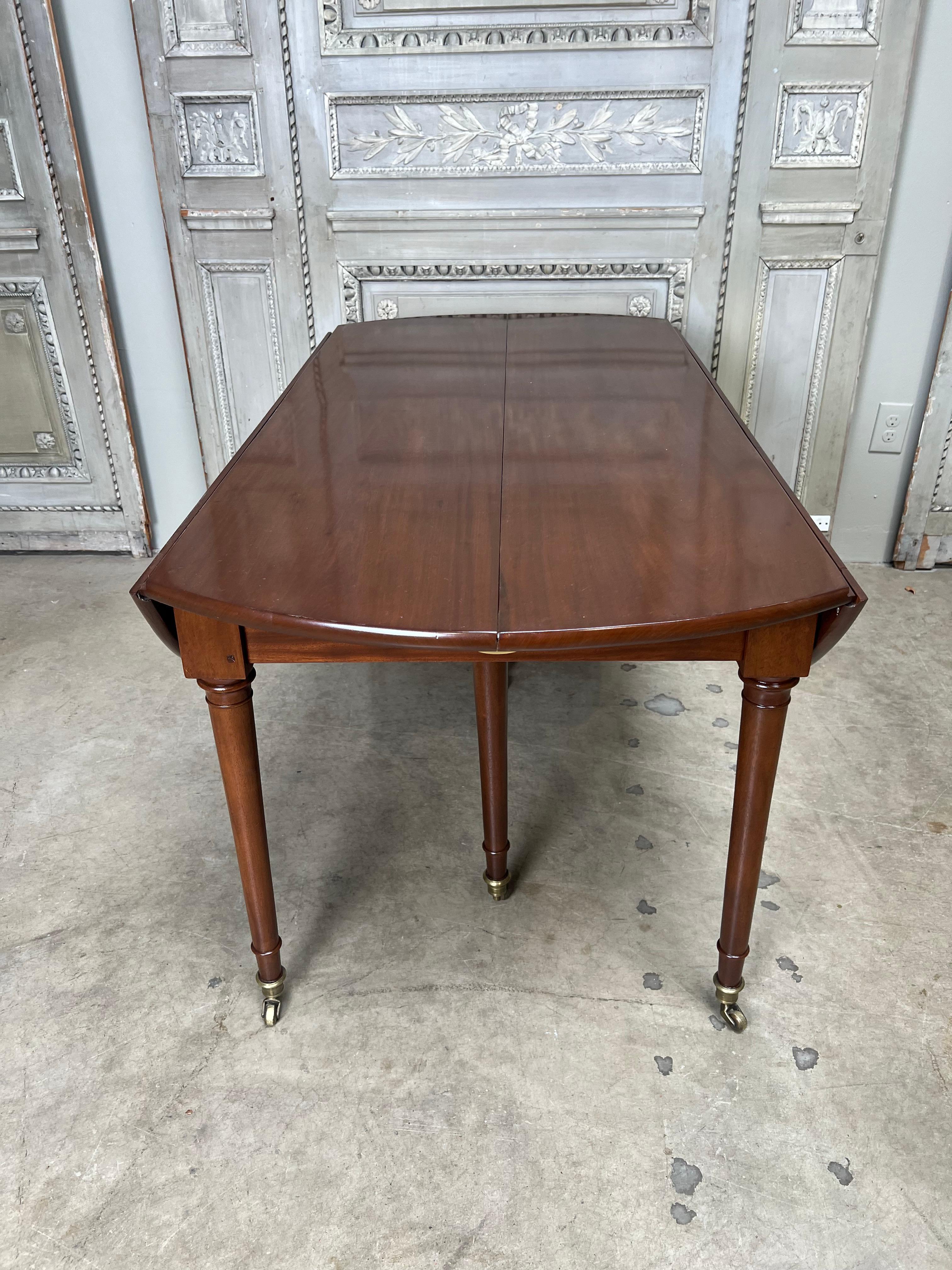 Cast Large 18th Century French Louis XVI Mahogany Dining Table.  For Sale