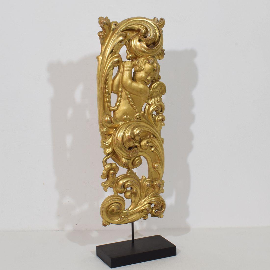 Hand-Carved Large 18th Century Italian Hand Carved Giltwood Baroque Curl Ornament With Angel For Sale