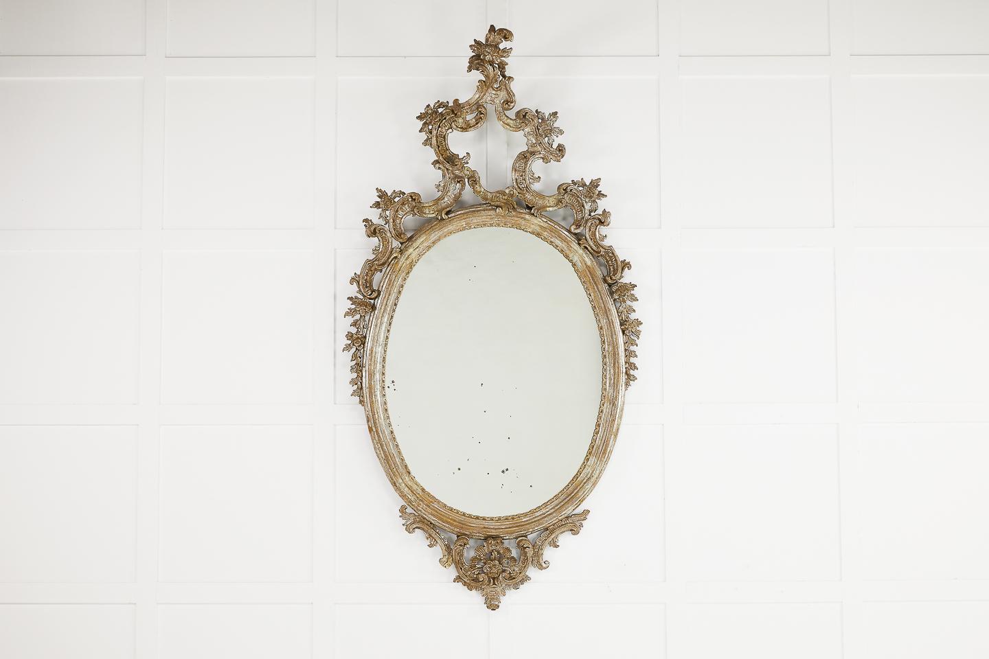 Large 18th century Italian mirror with its wonderful original aged silver gilt.
       