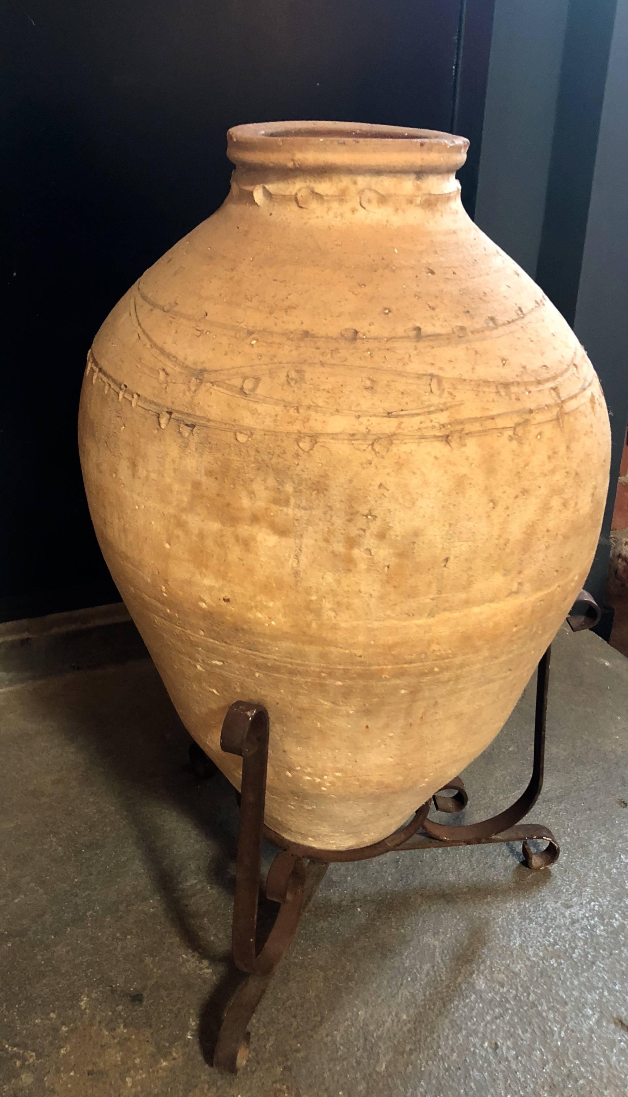 This impressive late 18th century terracotta water jar was found in Puglia (South of Italy)
In excellent condition and with great character, this jar once had a nice metal base and served as the water source for a 