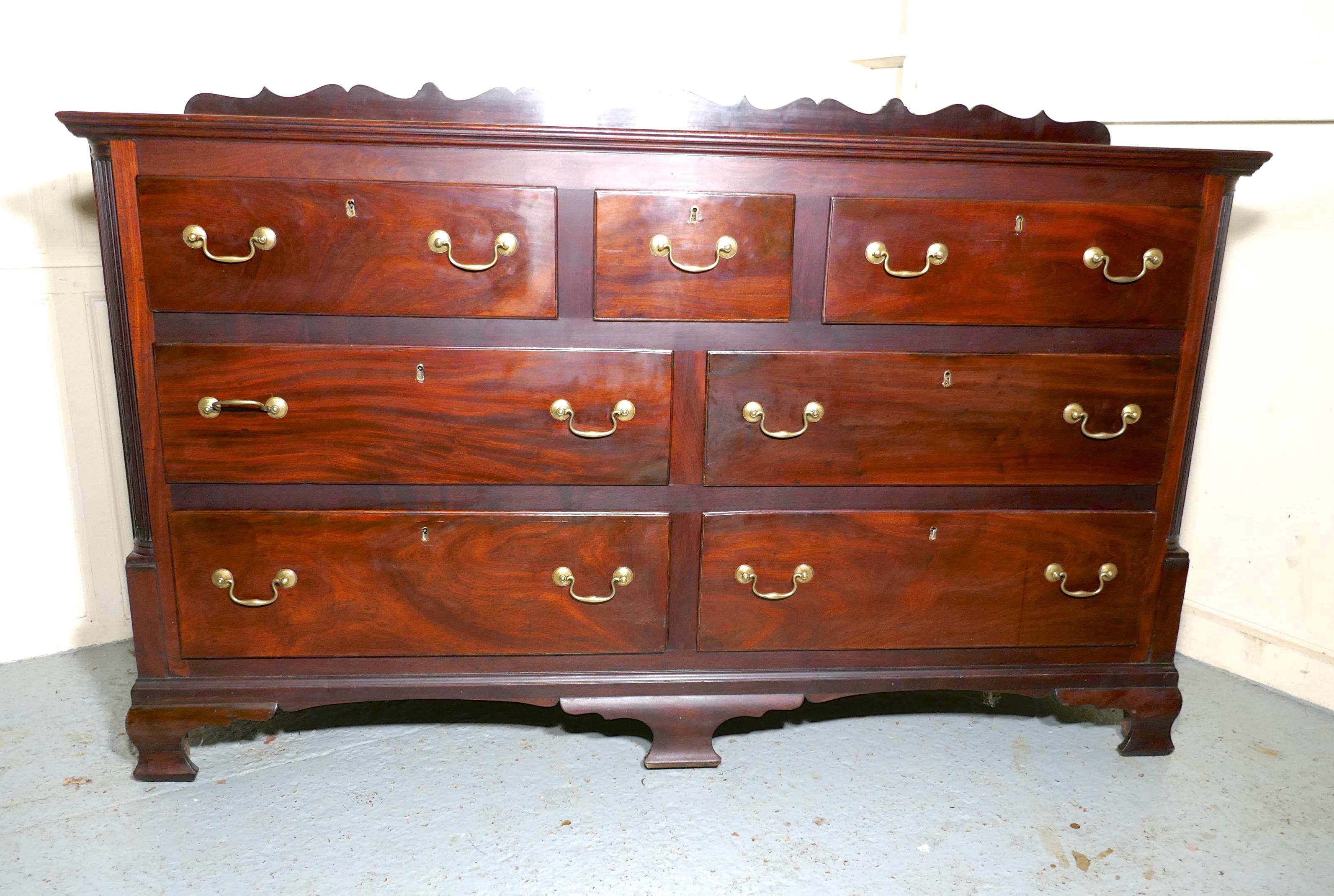 Large 18th Century Lancashire Chest of Drawers George III Dresser

This is an exceptionally fine quality piece, this is an 18th century George III chest of Drawers or Dresser circa 1780, it is oak lined and has an oak planked back
The chest has 7