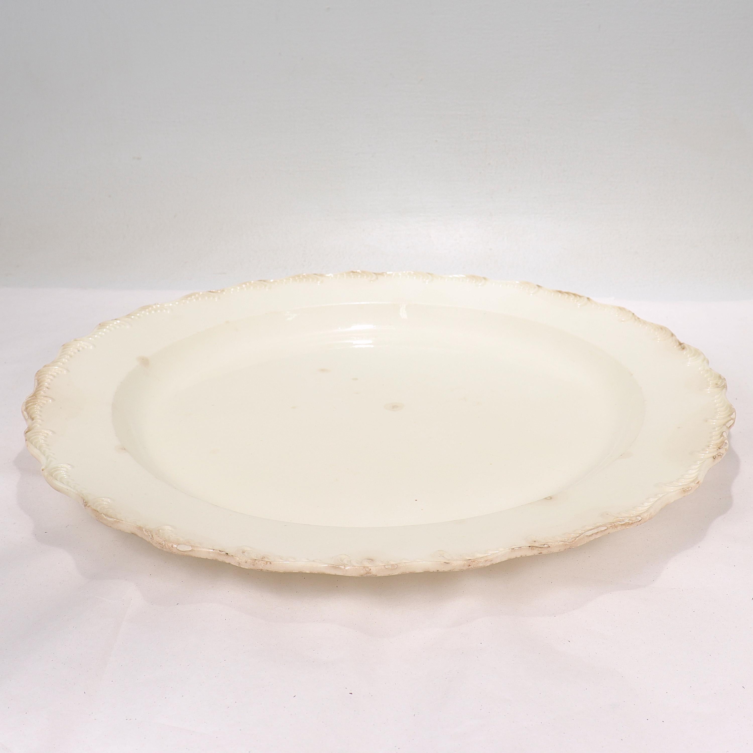 Large 18th Century Leeds/Staffordshire English Creamware Charger or Wall Plate In Fair Condition For Sale In Philadelphia, PA