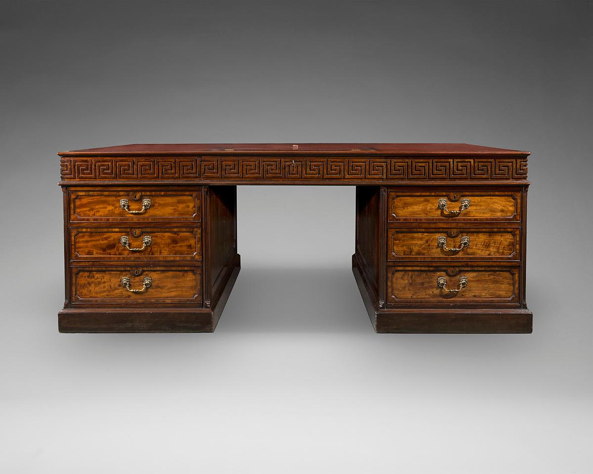 An outstanding and impressive large 18th century mahogany Chippendale period partners desk. The desk comes in three parts, two pedestals and the top section which has a double Greek key pattern around the frieze incorporating six drawers. 
The