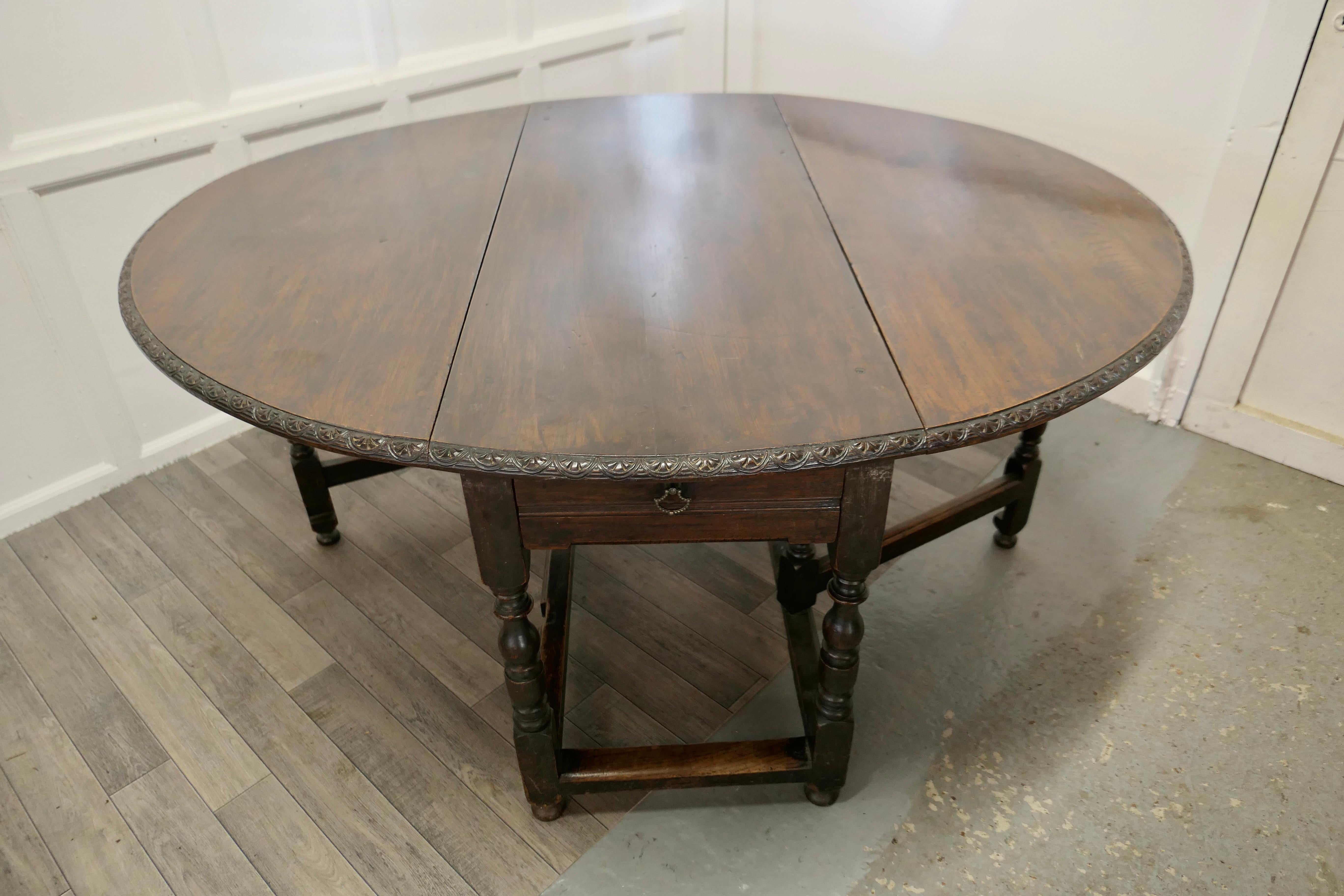 Large 18th Century Oak Gate Leg Dining Table

This is a large and magnificent table, the table is made from solid Oak, a rare and much prized wood by cabinet makers. This is a large table with a gate leg at each side to support the large deep