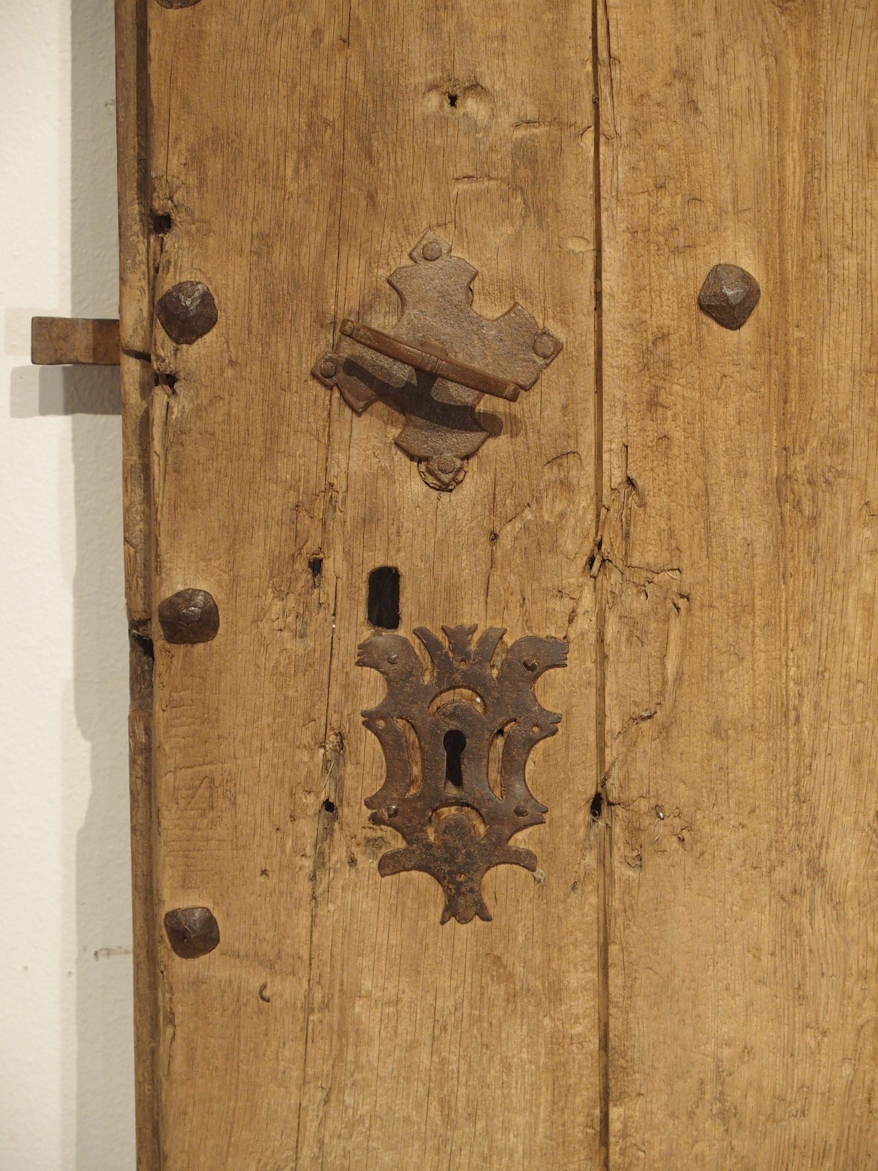 Hand-Carved Large 18th Century Oak Plank Spanish Door with Wrought Iron Nailheads
