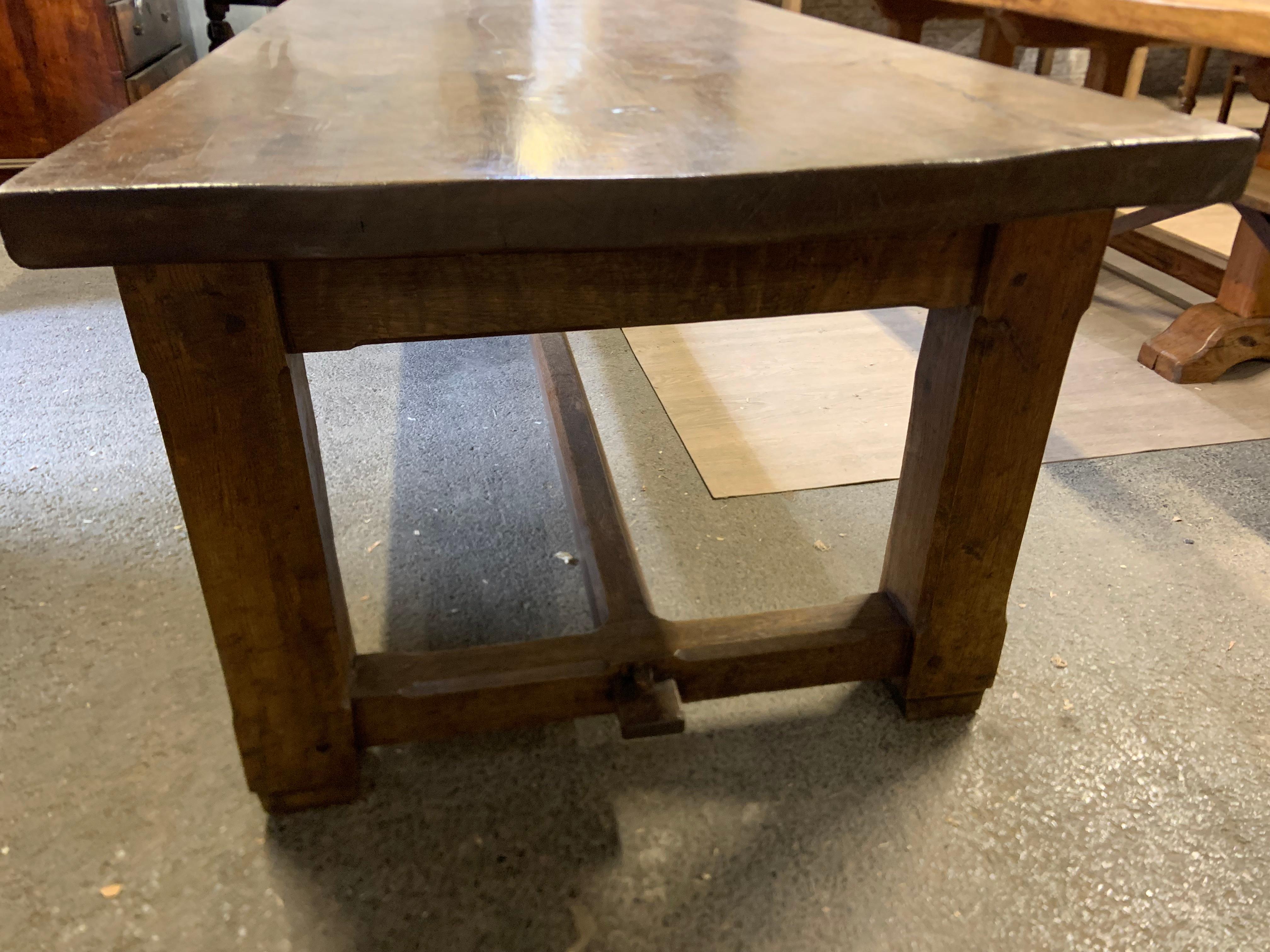 Large 18th century style oak refectory dining table with great proportions. The table has a centre stretcher and stunning top. This table has exceptional width.
    
