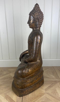 Large 18th century Thai gilt bronze seated figure of Buddha Shakyamuni