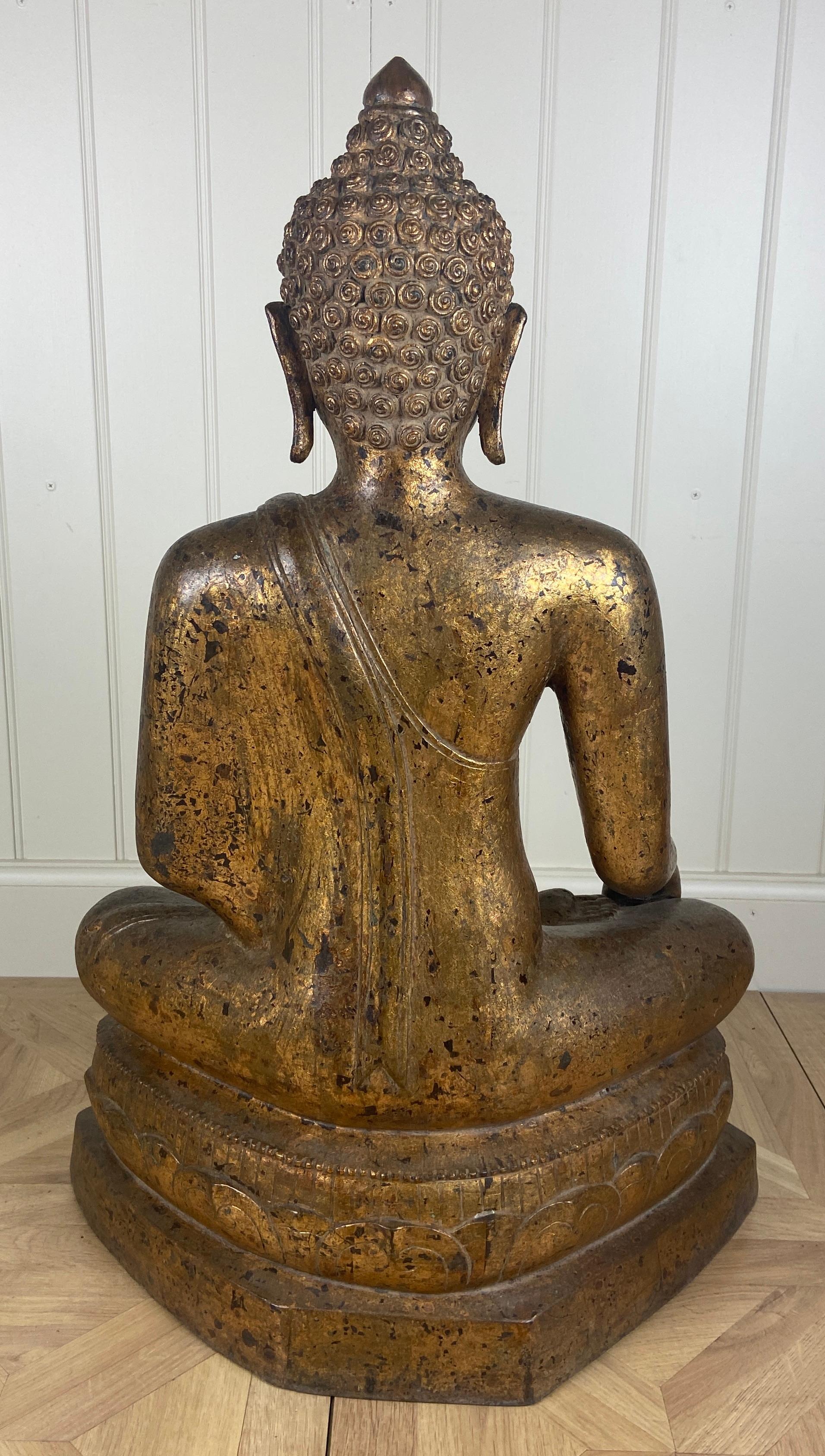 Large 18th century Thai gilt bronze seated figure of Buddha Shakyamuni In Good Condition For Sale In Henley-on-Thames, Oxfordshire