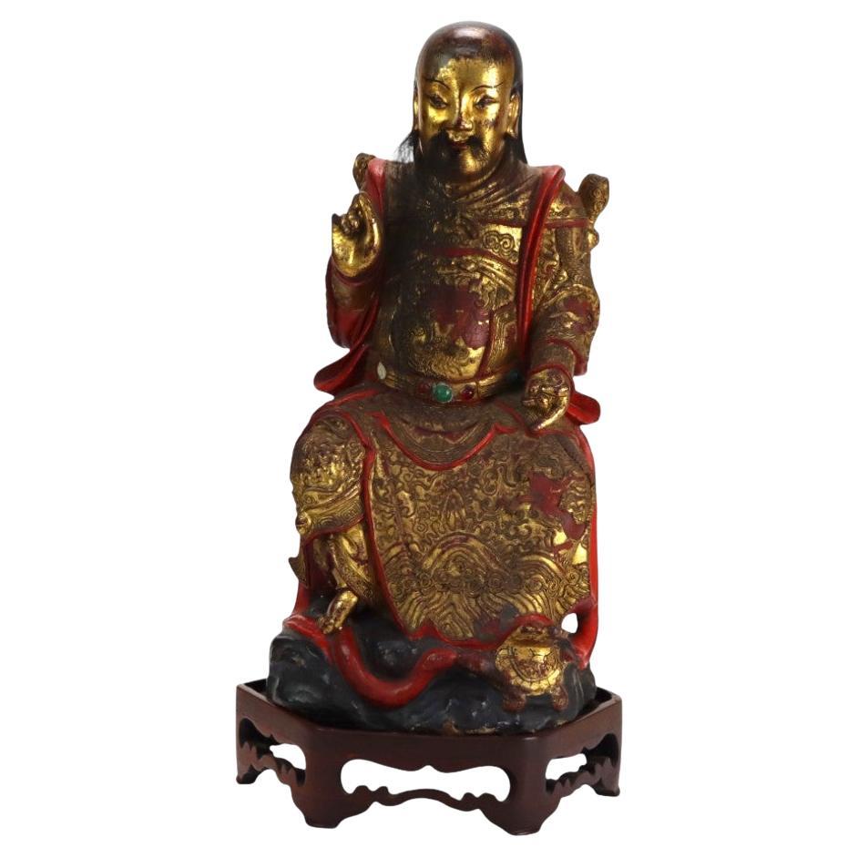 Large 18thC Carved Vermillion 
Gilt Deity Statue en vente