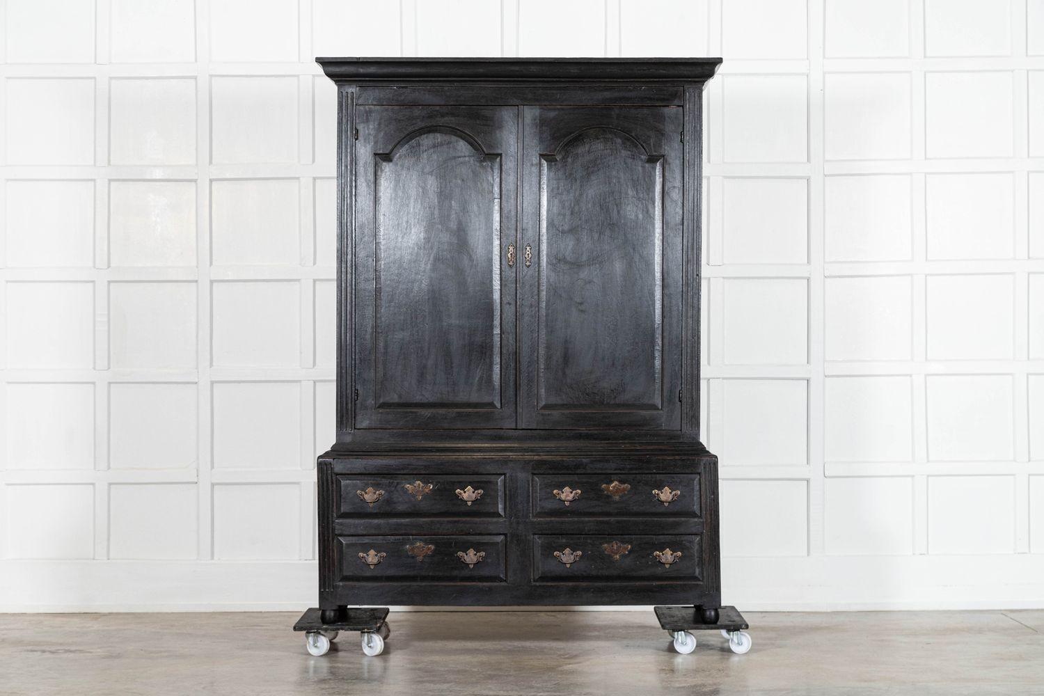 circa 1770
Large 18thC English Ebonised Oak Livery Cupboard
sku 2036
Together W138 x D48 x H195 cm
Base W137 x D46 x H60 cm
Top W138 x D48 x H135 cm
Top internal shelf depth 37.5 cm
Weight 78Kg