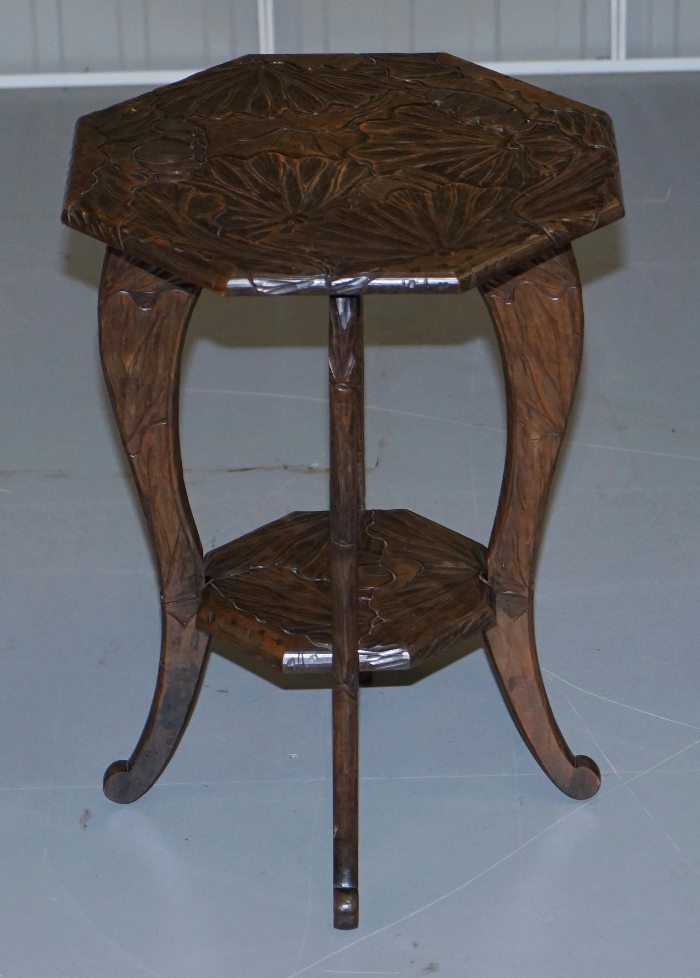 We are delighted to offer for sale this lovely large Liberty’s London 1905 Japanese mahogany side table

A good looking piece, its hand carved from top to bottom with floral detailing 

We have deep cleaned hand condition waxed and hand polished