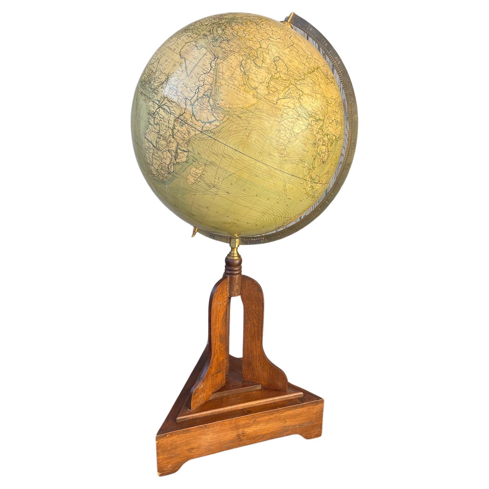 Large Vintage Globe on Wood Base, circa 1920's

Decorate an office or a desk with this beautifully preserved antique globe. Crafted in Europe, circa 1920's this piece is mounted on a simple wooden pedestal base.  