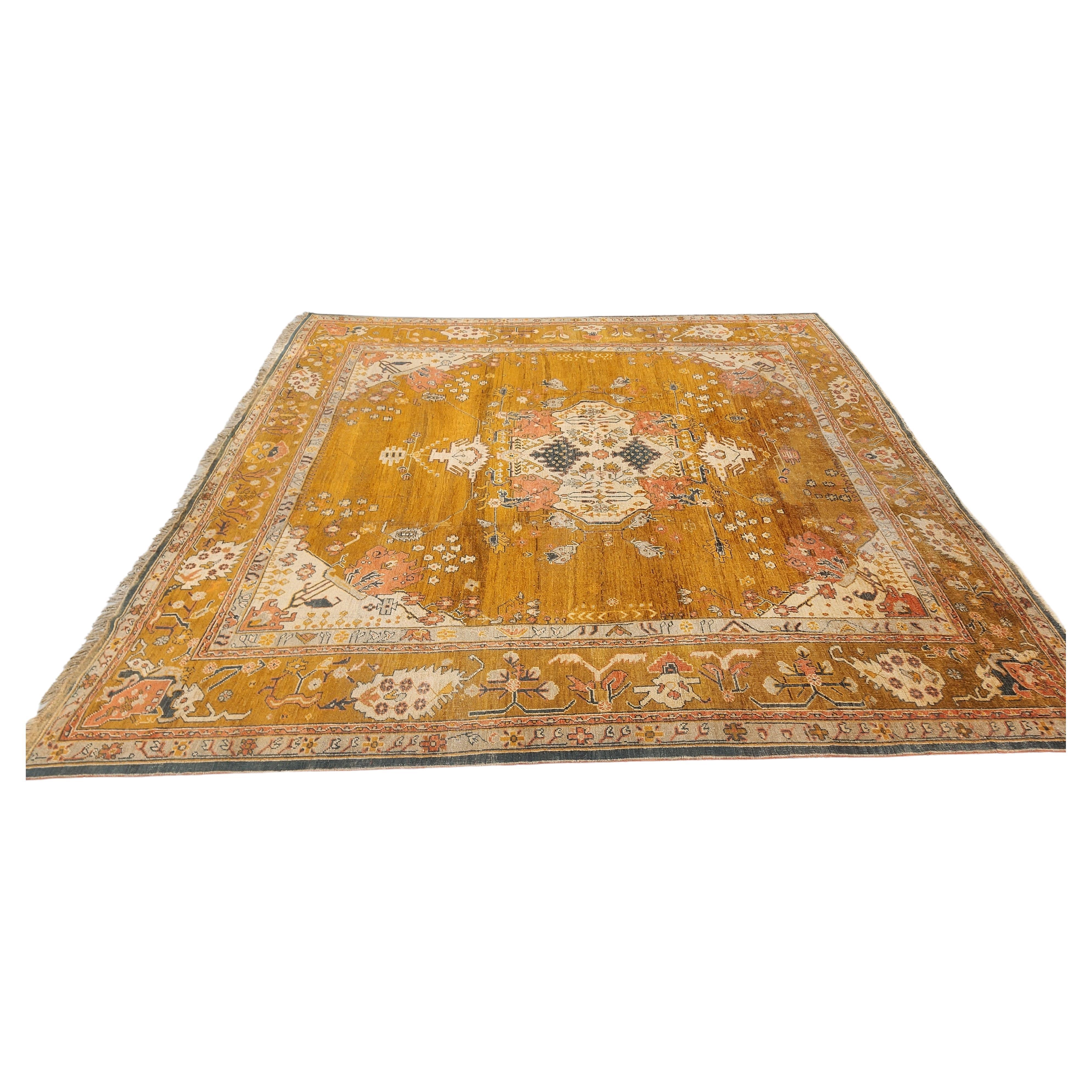Great condition . Acquired from a private Malibu Estate. Dated 1920s . Beautiful boasting colors. 
Oushak rugs, also known as Ushak rugs, are woven in Western Turkey and have distinct designs, such as angular large-scale floral patterns. They
