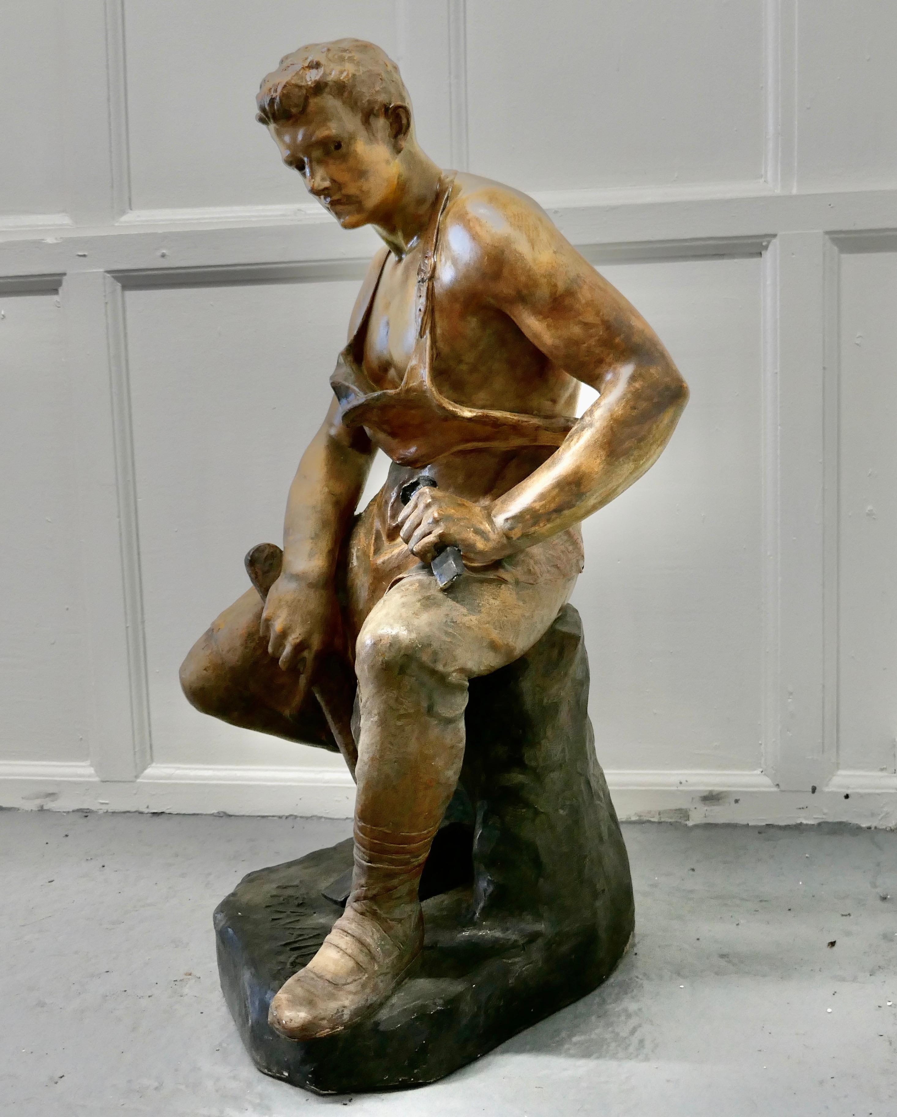 Large 1920s plaster figure of the seated blacksmith, Le Travail

A charming piece Folk Art, a painted statue of the famous blacksmith, known as “Le Travail”
A wonderful and large piece is truly 3 dimensional and looks good from all sides
The