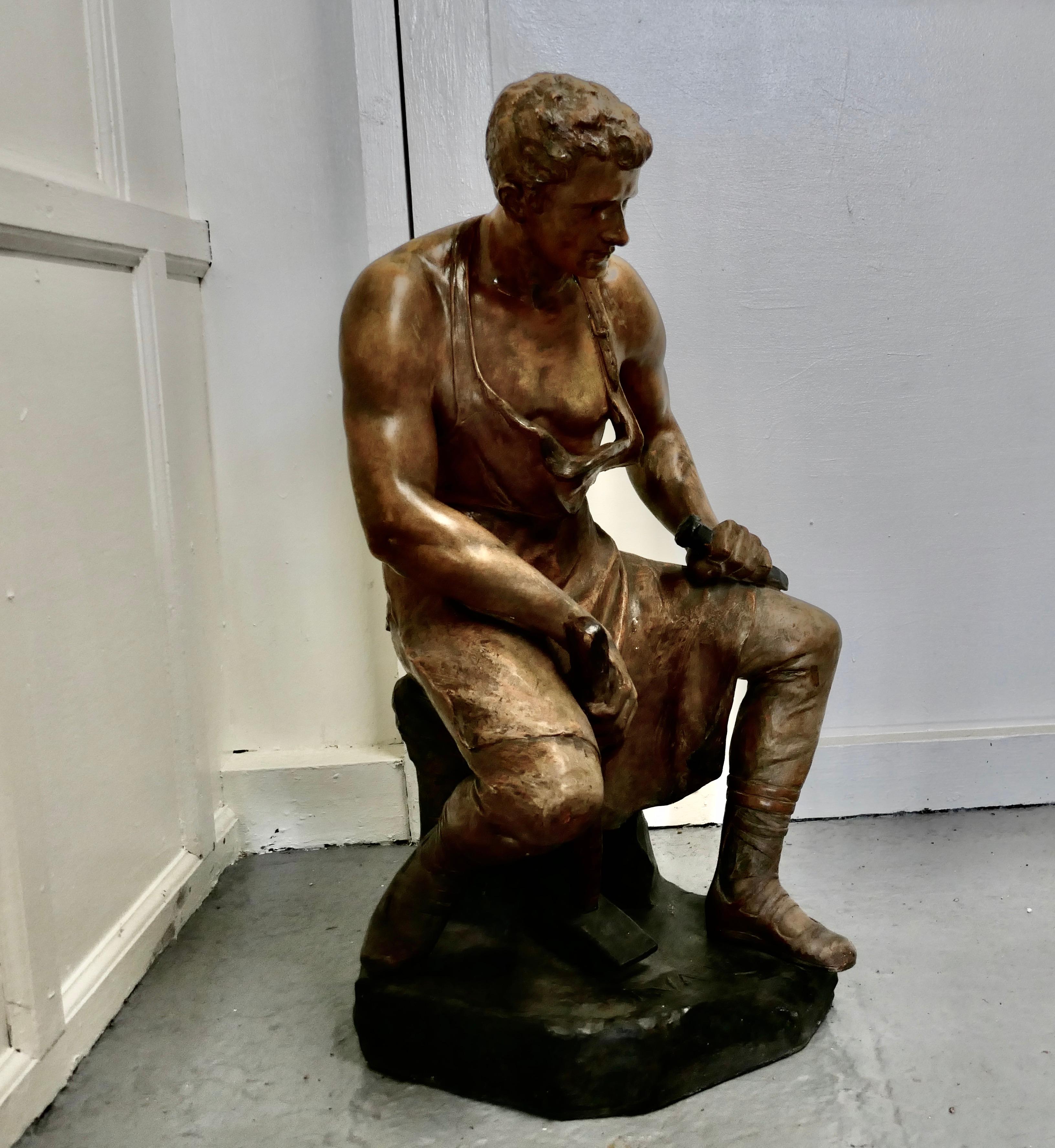 Black Forest Large 1920s Plaster Figure of the Seated Blacksmith, Le Travail For Sale