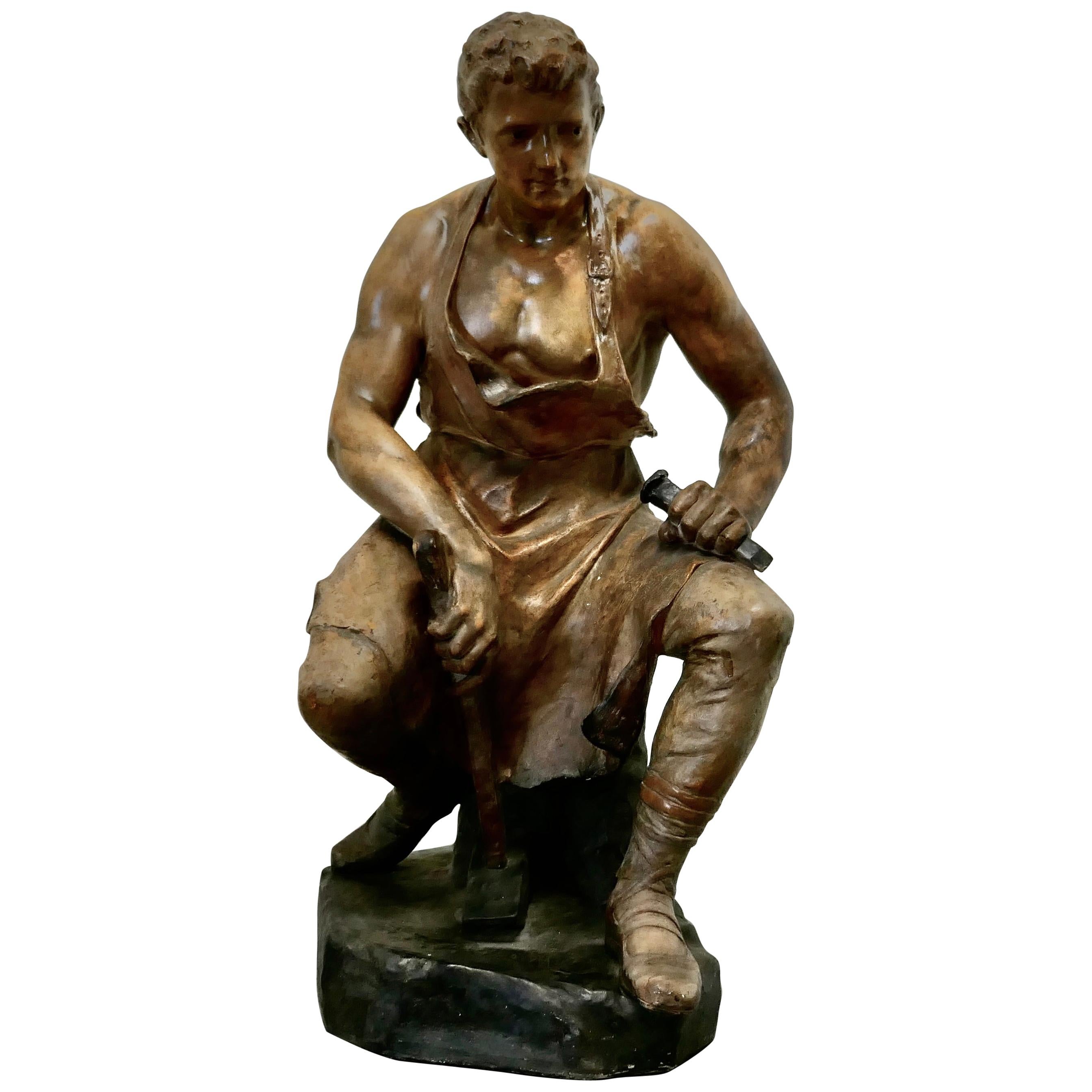 Large 1920s Plaster Figure of the Seated Blacksmith, Le Travail For Sale