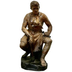 Antique Large 1920s Plaster Figure of the Seated Blacksmith, Le Travail