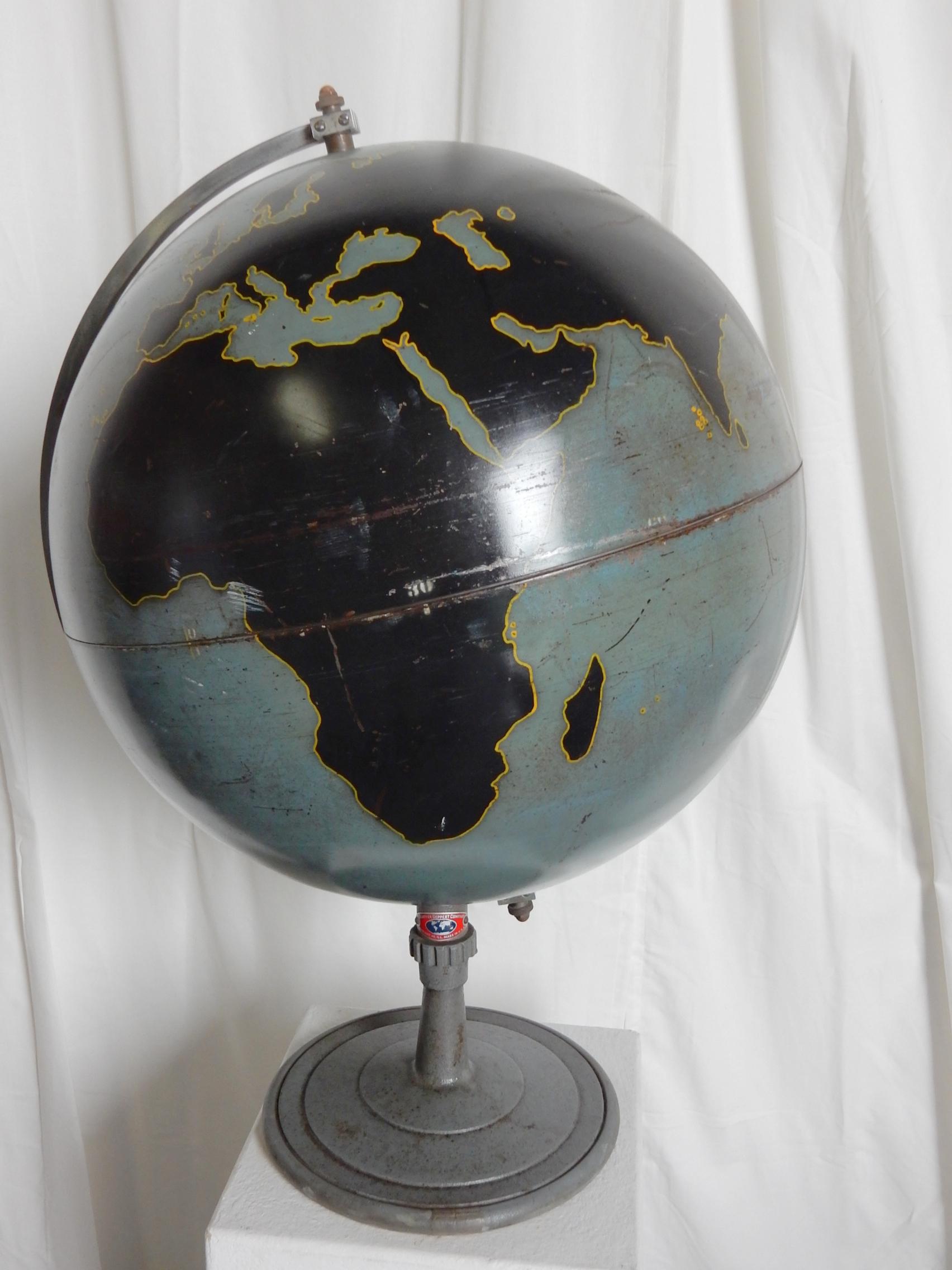 20 inch Denoyer Geppert of Chicago military world globe.
Made of thick spun metal on a heavy iron stand.
Like a chalkboard, this was an educational instrument.
Completely original paint. Solid condition with no missing or loose parts.
Stands 31