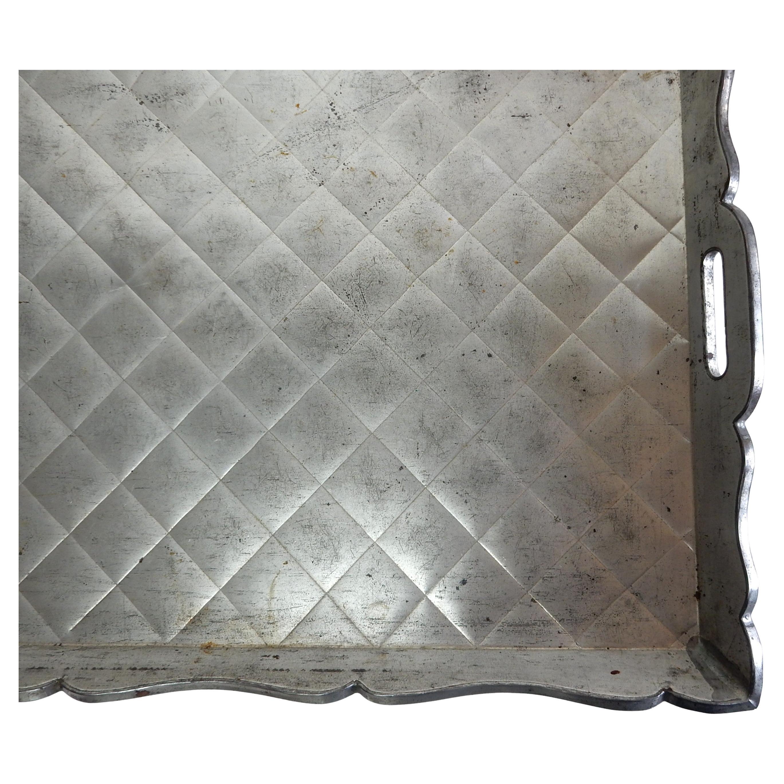 Large embossed XXXX on tin veneer over wood serving tray from the artisans in Hermosillo, Sonora circa 1940. It is just over 2 feet wide.
This tray has all the right age & patina with no damage.
Nice soulful display piece or use as a table top bar