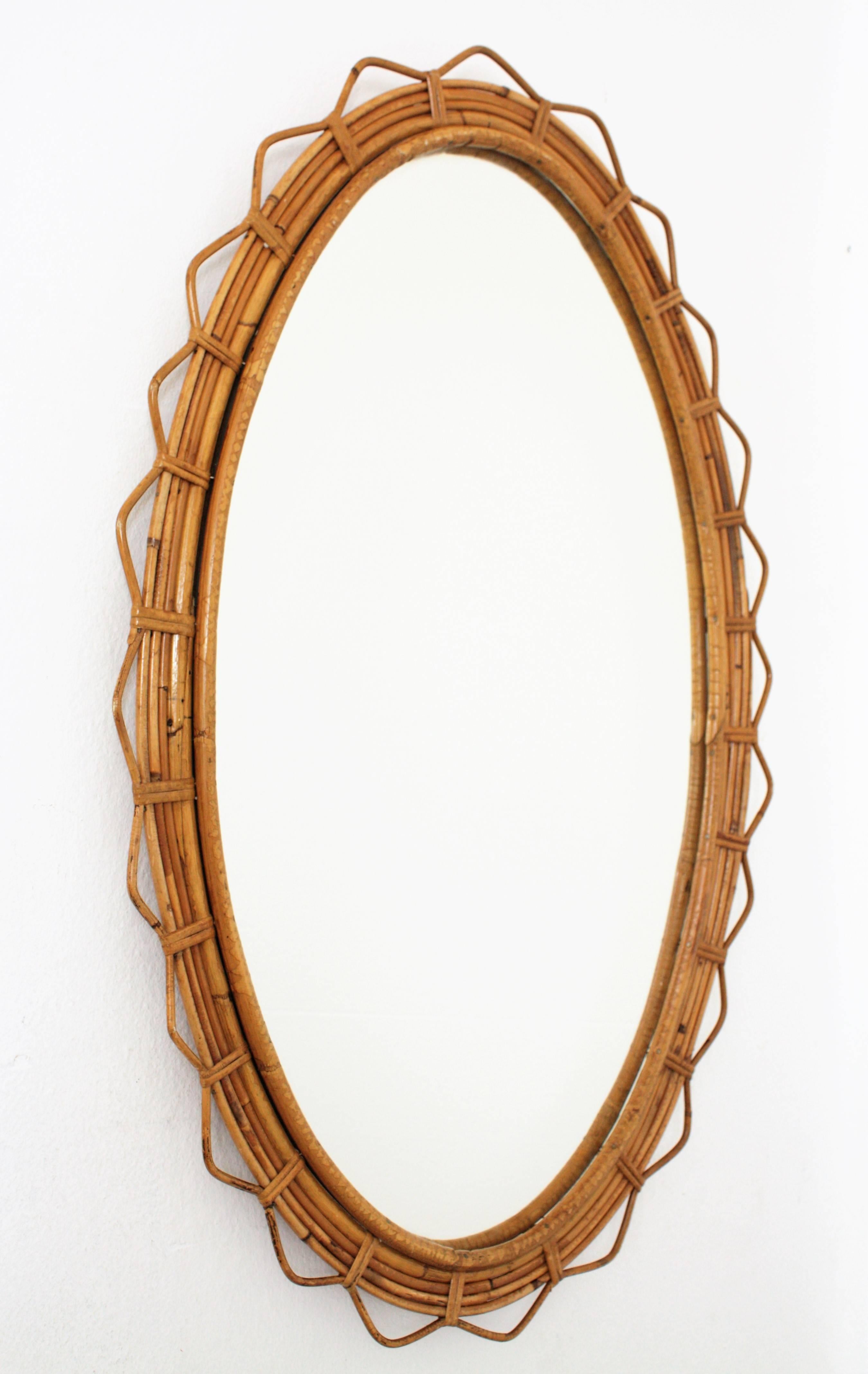 Mid-Century Modern Large 1950s French Riviera Bamboo and Rattan Jagged Edge Oval Sunburst Mirror