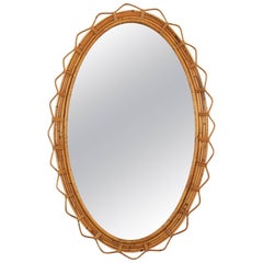 jagged mirror Large 1950s French Riviera Bamboo and Rattan Jagged Edge Oval Sunburst Mirror