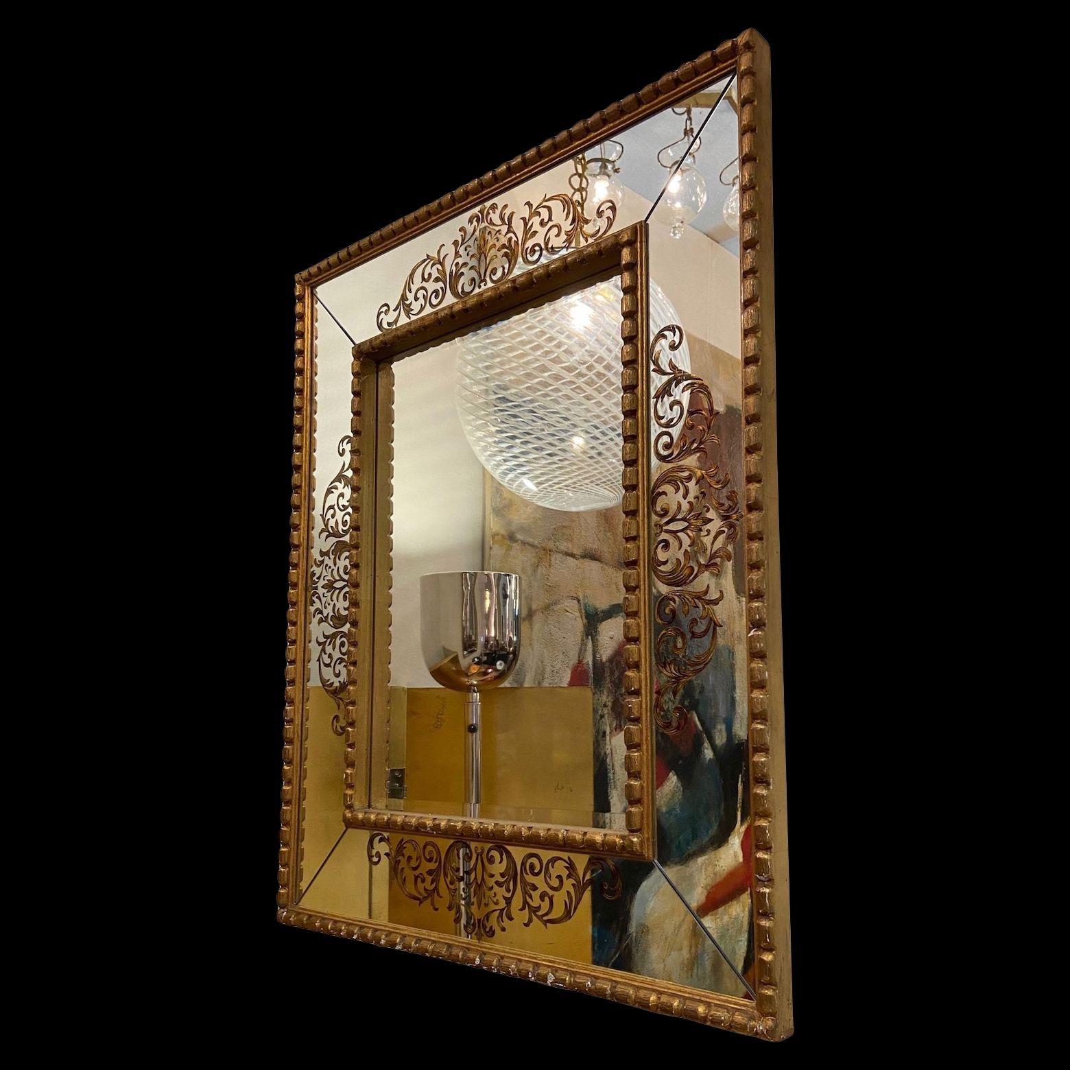 Large 1950's gilt wood decorated French mirror.