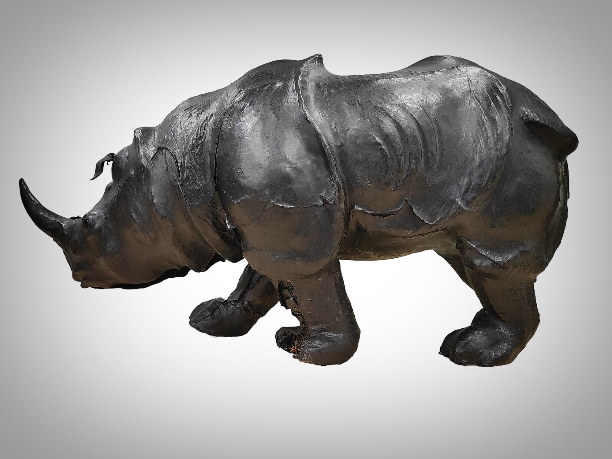 Introducing an imposing leather rhinoceros from the 1950s, a decorative piece of European origin that reflects the exceptional craftsmanship of the era. This meticulously crafted leather rhinoceros is a testament to the quality and attention to