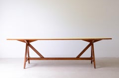Large 1950's oak table with a pastel yellow Formica top.