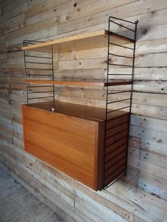Large 1950's String metal framed wall System with record cabinet and two shelves