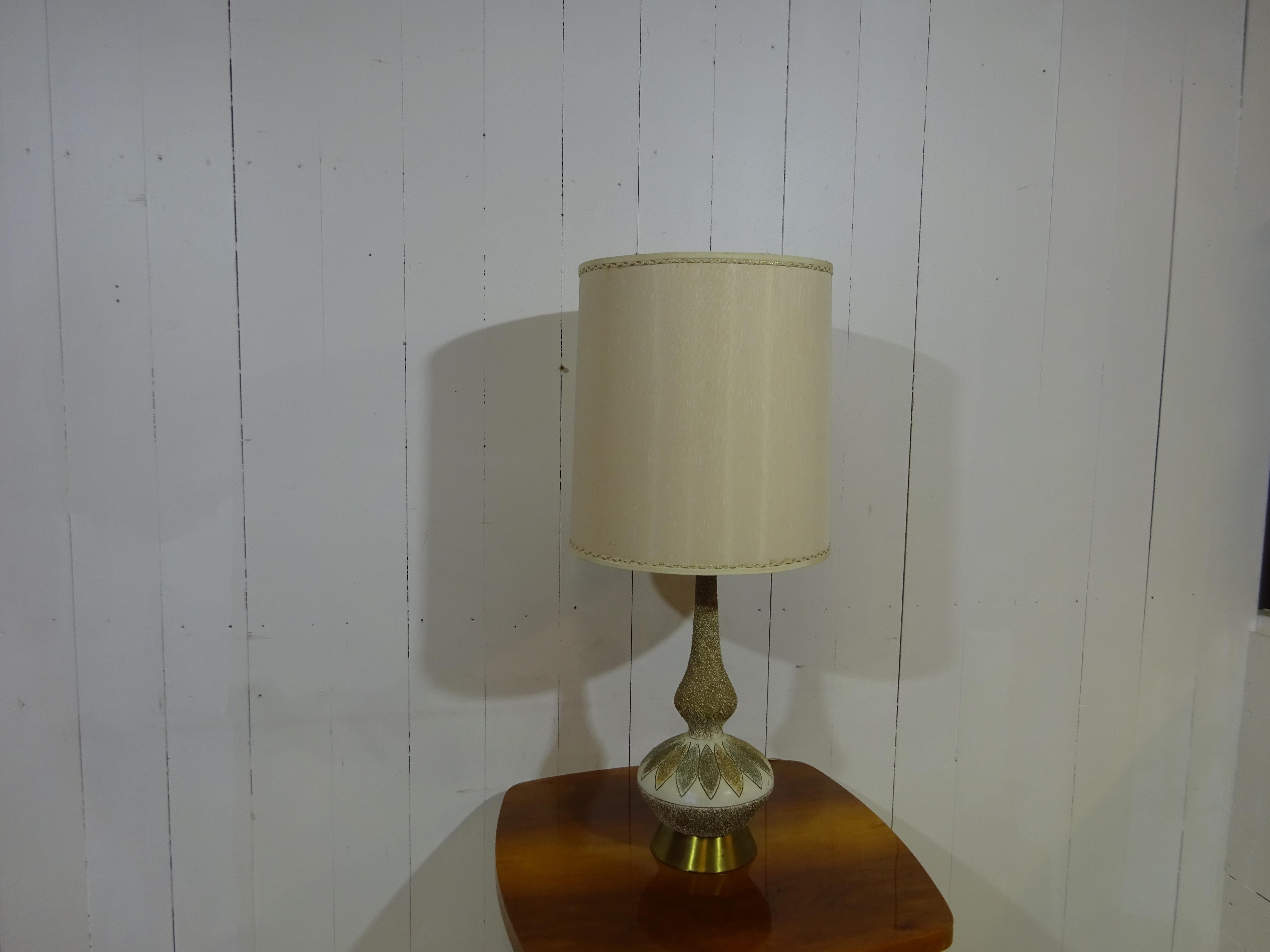 effect applied and then a stunning flower shape created with a selection of subtle colours. 
Above is a lamp holder supporting the original large lamp shade. Rewired and fitted with a vintage style bulb for a gentle lighting effect. 

It is a