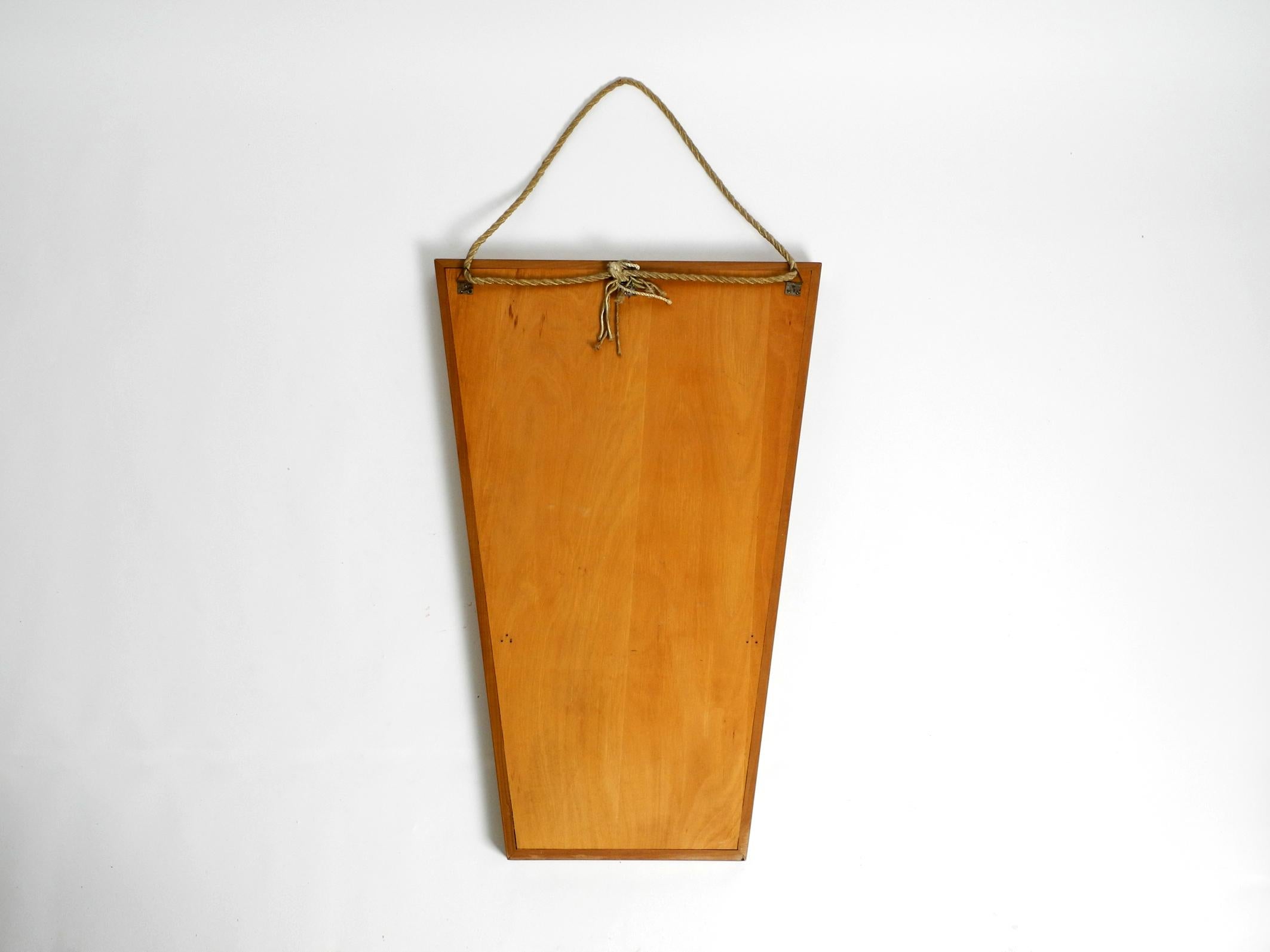 Large 1950s wall mirror in trapezoidal shape with a solid cherry wood frame For Sale 3