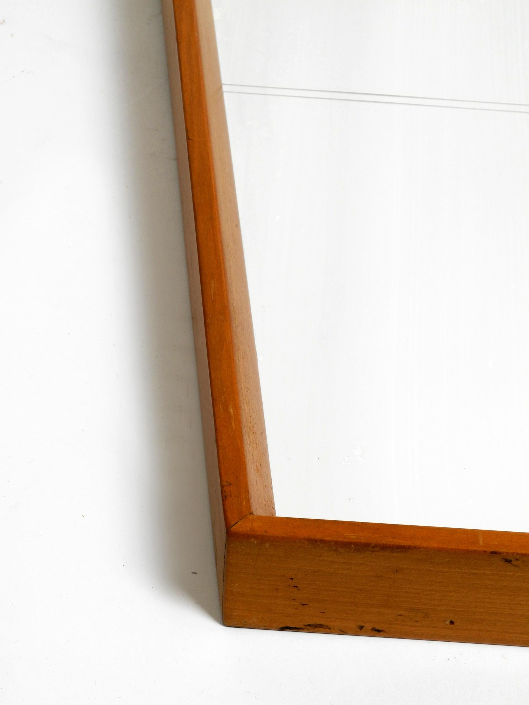 Large 1950s wall mirror in trapezoidal shape with a solid cherry wood frame For Sale 9