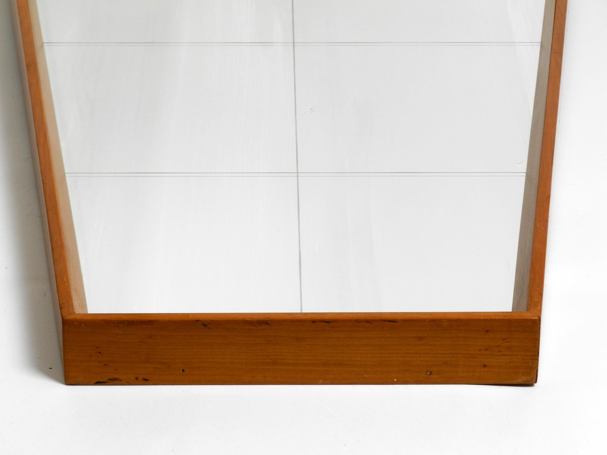 Large 1950s wall mirror in trapezoidal shape with a solid cherry wood frame For Sale 10