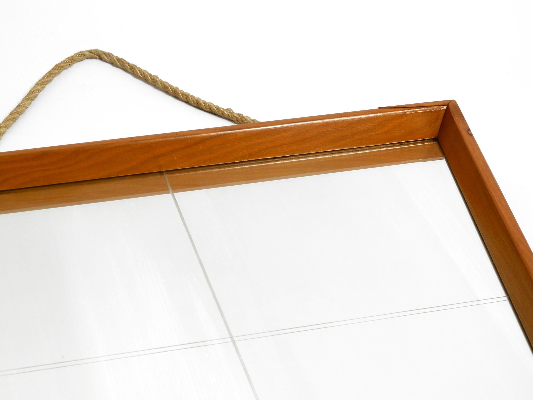 Large 1950s wall mirror in trapezoidal shape with a solid cherry wood frame For Sale 13
