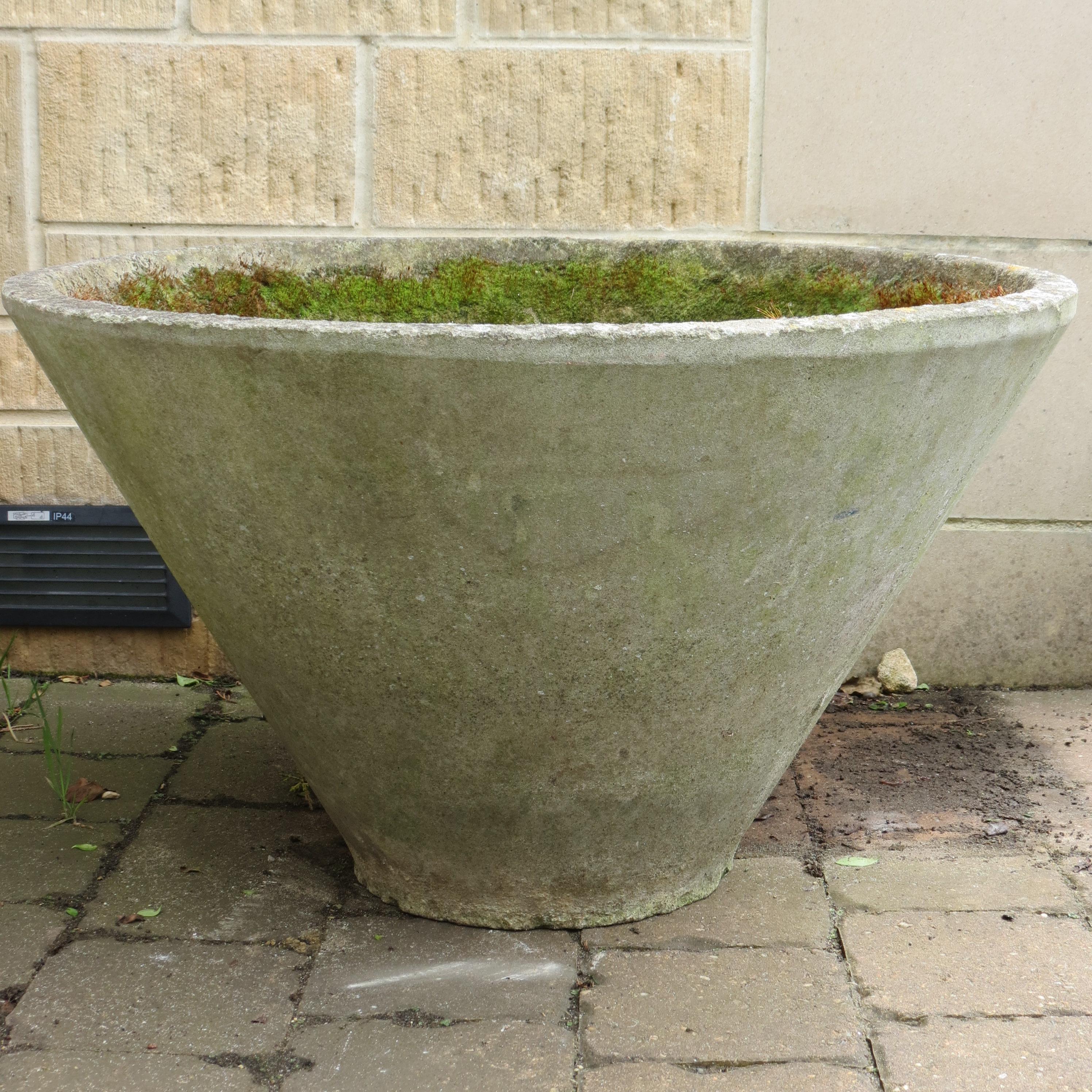 Large concrete garden planter from the 1960s or 1970s. Very good quality, heavy planter made from reinforced concrete.  In good vintage condition, some wear over all and very nicely patinated. Smooth exterior to the pot, one small area of surface