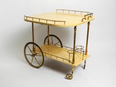 Large 1960s Aldo Tura serving bar cart covered with goat leather in beige yellow