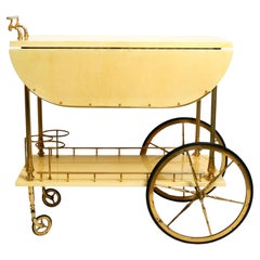 Large 1960s Aldo Tura serving bar cart covered with goat leather in beige yellow
