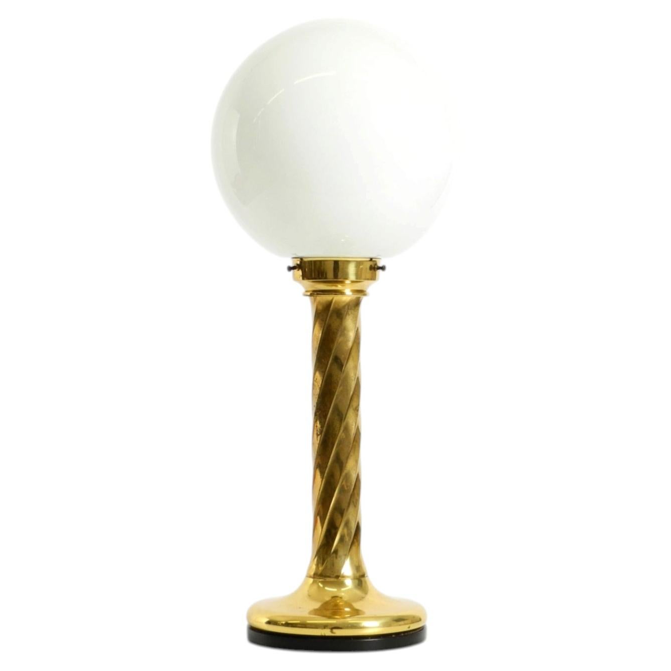 Large 1960s brass column-style table lamp with frosted glass globe For Sale