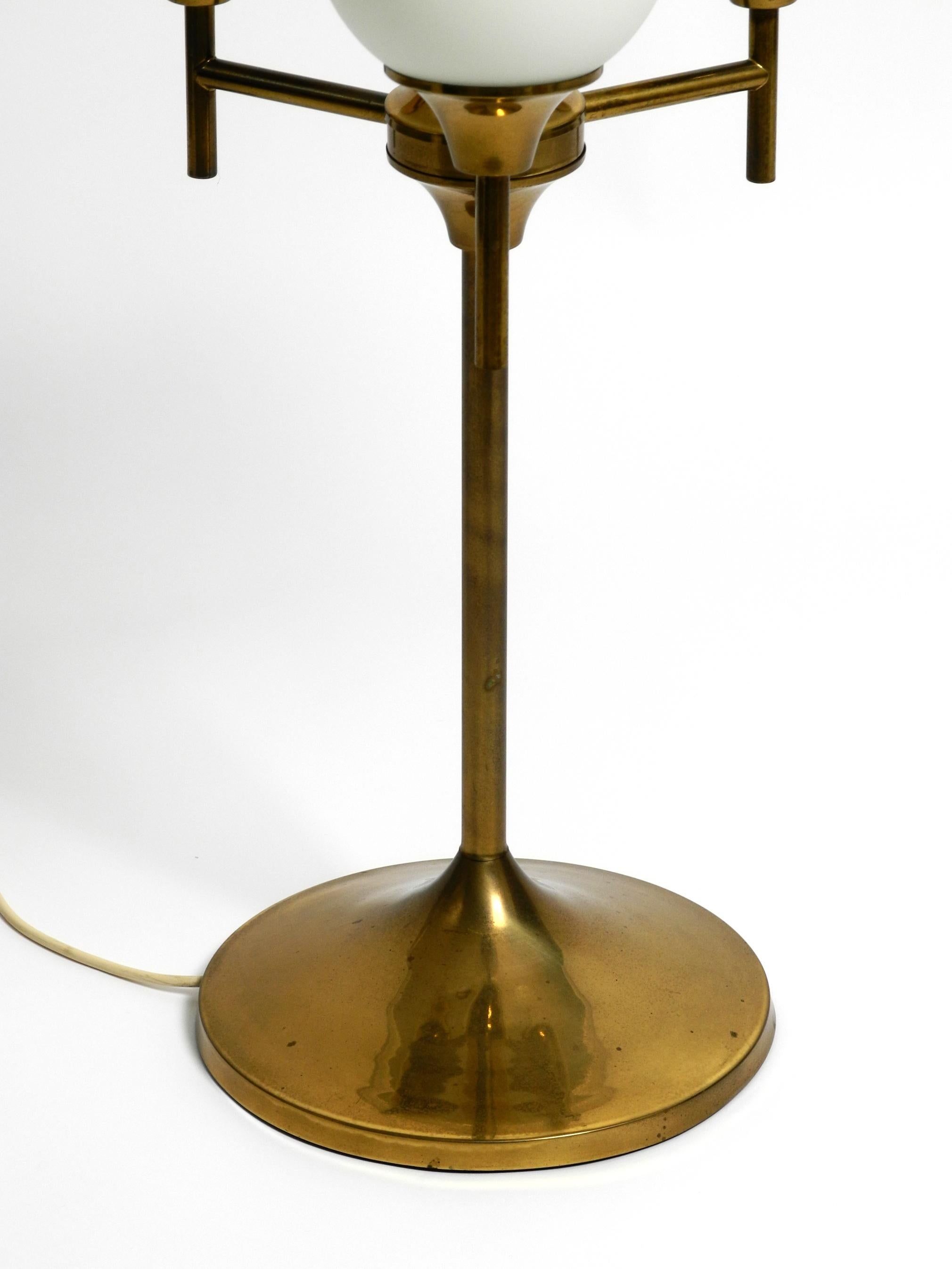 Large 1960s brass table or floor lamp with 4 glass spheres by Kaiser Leuchten For Sale 8