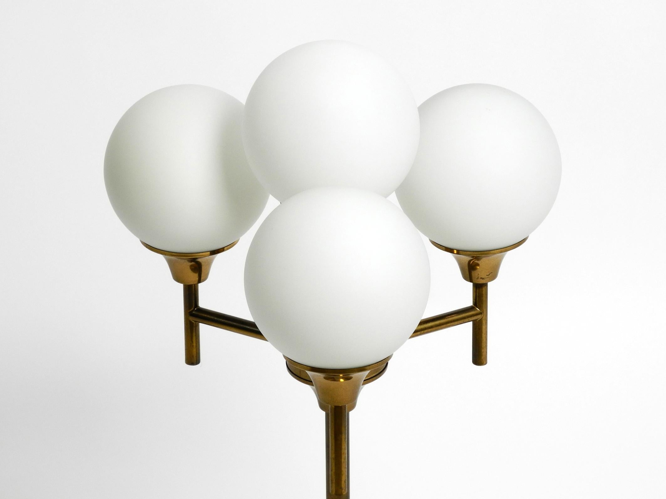 Large 1960s brass table or floor lamp with 4 glass spheres by Kaiser Leuchten For Sale 10