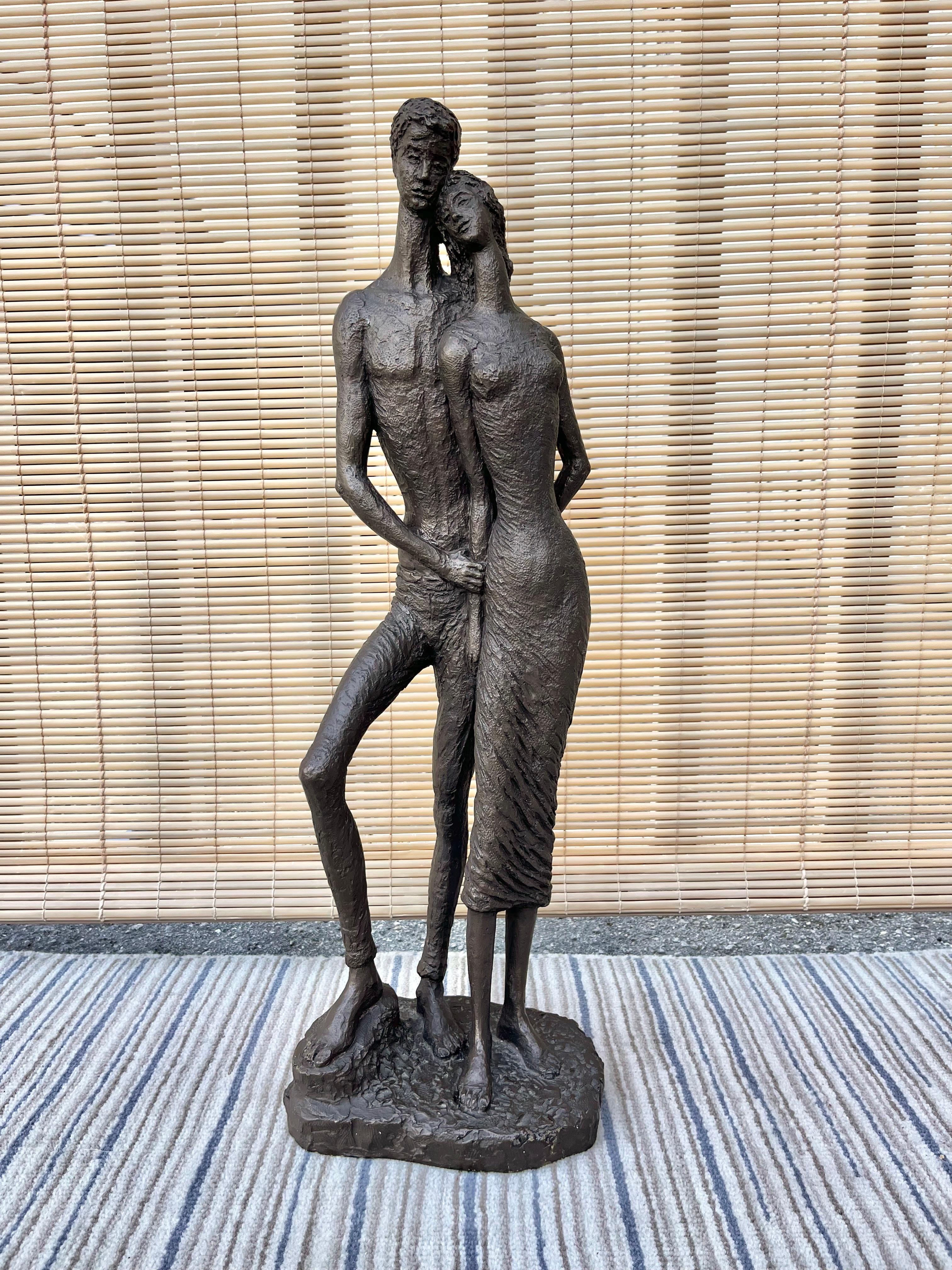 Large Mid-Century Modern Brutalist sculpture by Edward Schillaci for Austin Production. Signed by the artist. Dated 1962.
Features a textured image of a standing couple holding hands. 
Good original condition with minor signs of wear consistent