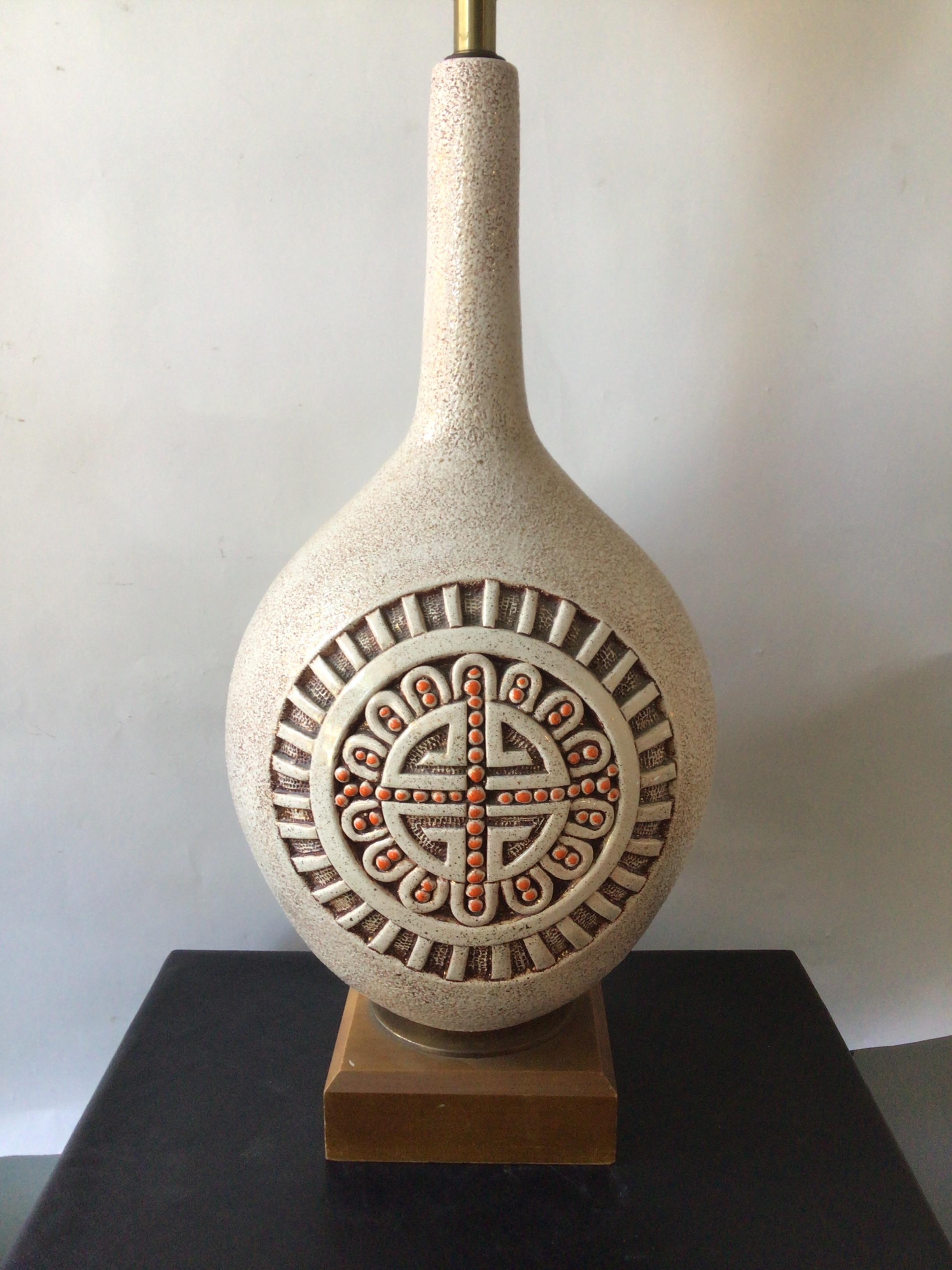 Large 1960s ceramic lamp on wood base.