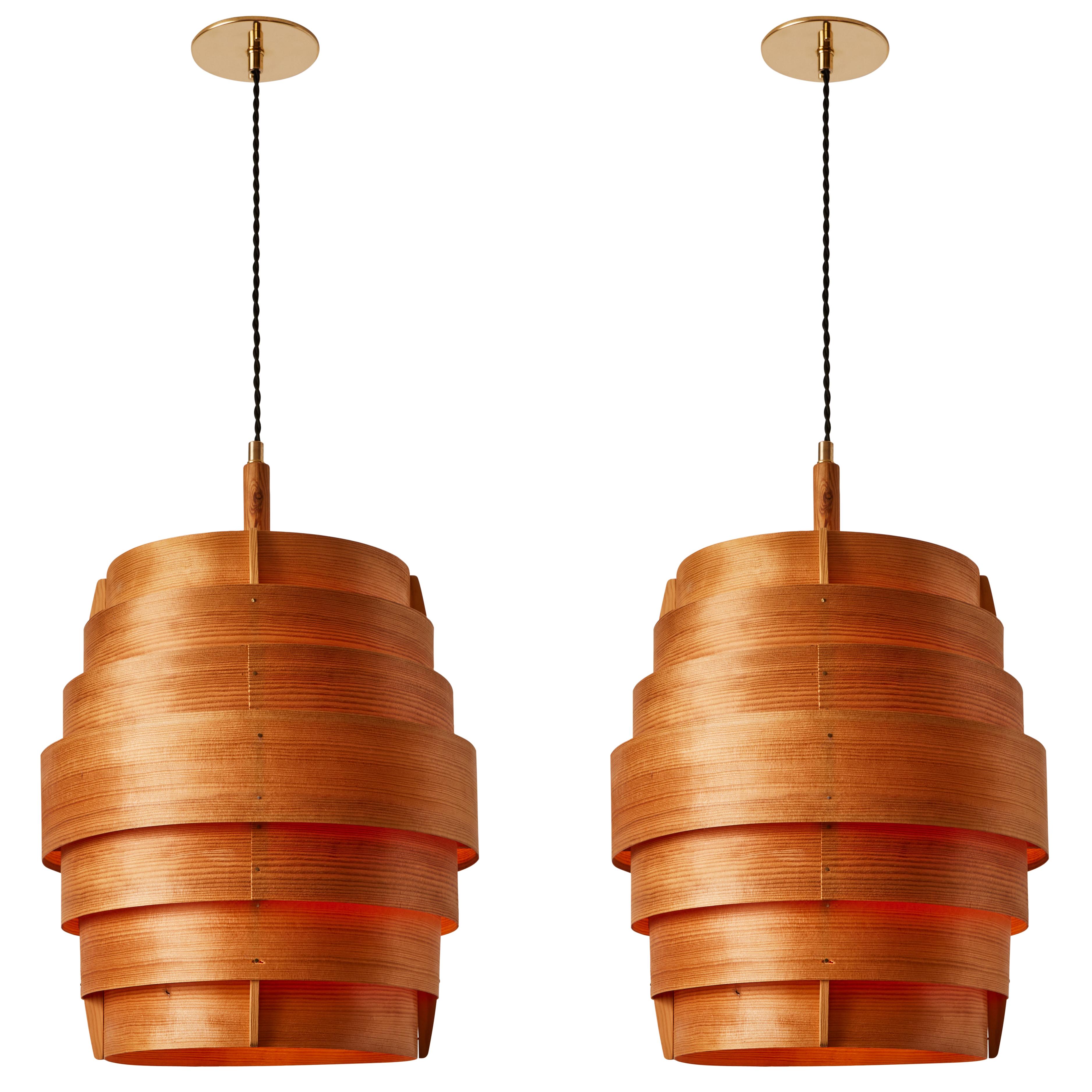 Large 1960s Hans-Agne Jakobsson Geometric Bentwood Pendant for AB Ellysett Designed and produced by Jakobsson in Markaryd, Sweden and executed in thin bentwood with custom cloth cord and thick polished brass canopies for US electrical. A uniquely