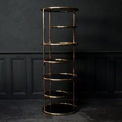 Large 1960s Milo Baughman Style Seven Tiered Brass Smoked Glass Swivel Étagère