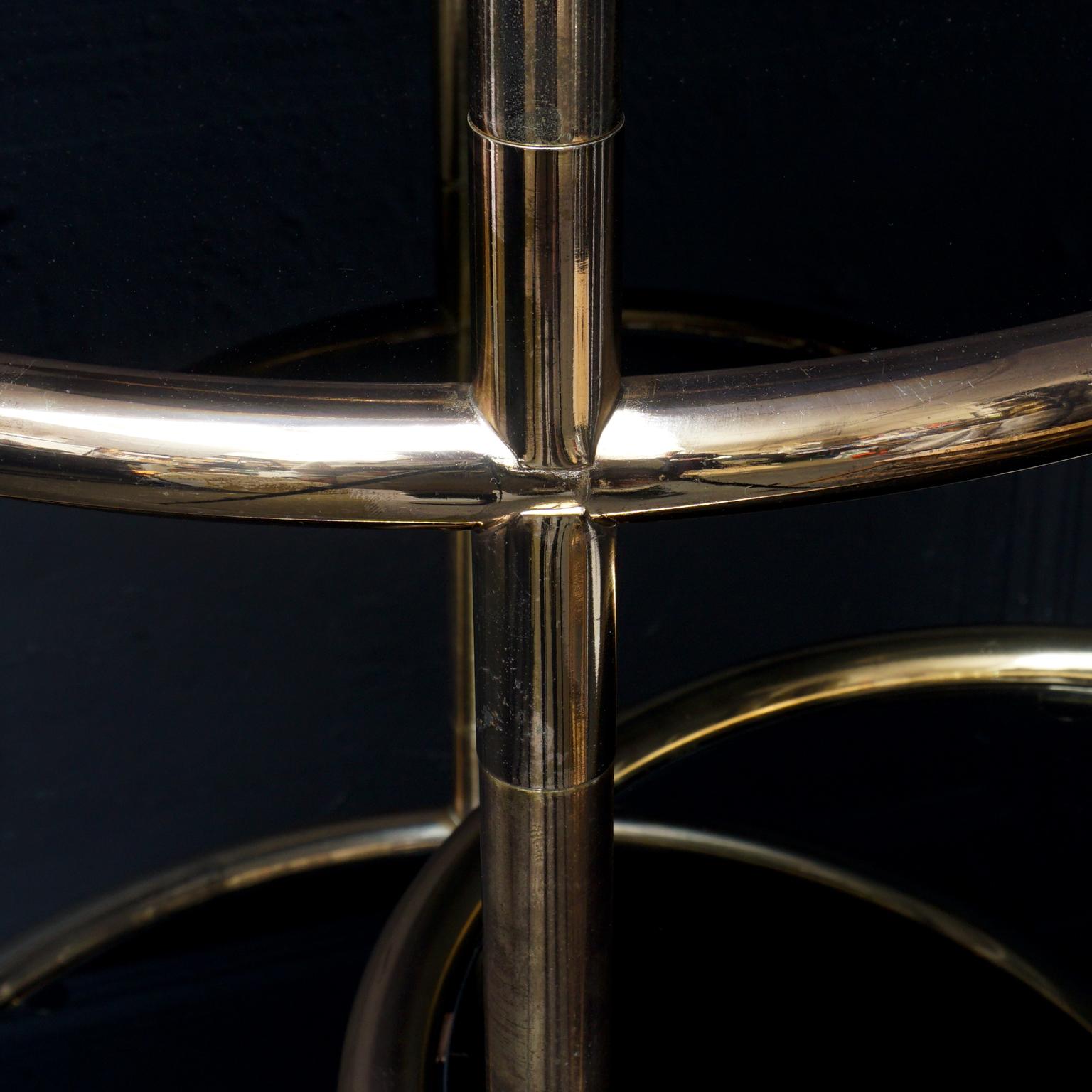 Central American Large 1960s Milo Baughman Style Seven Tiered Brass Smoked Glass Swivel Étagère