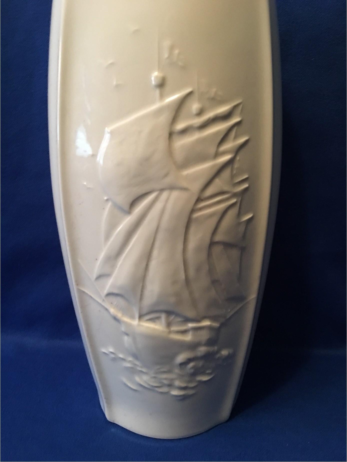 Very lovely glazed porcelain vase manufactured by Schuman of Arzberg in the state of Bavaria in Germany. From the 1960s. It depicts a beautiful maritime sea scene of a sailing ship sailing with all of its sails hoisted into the wind. A very nice