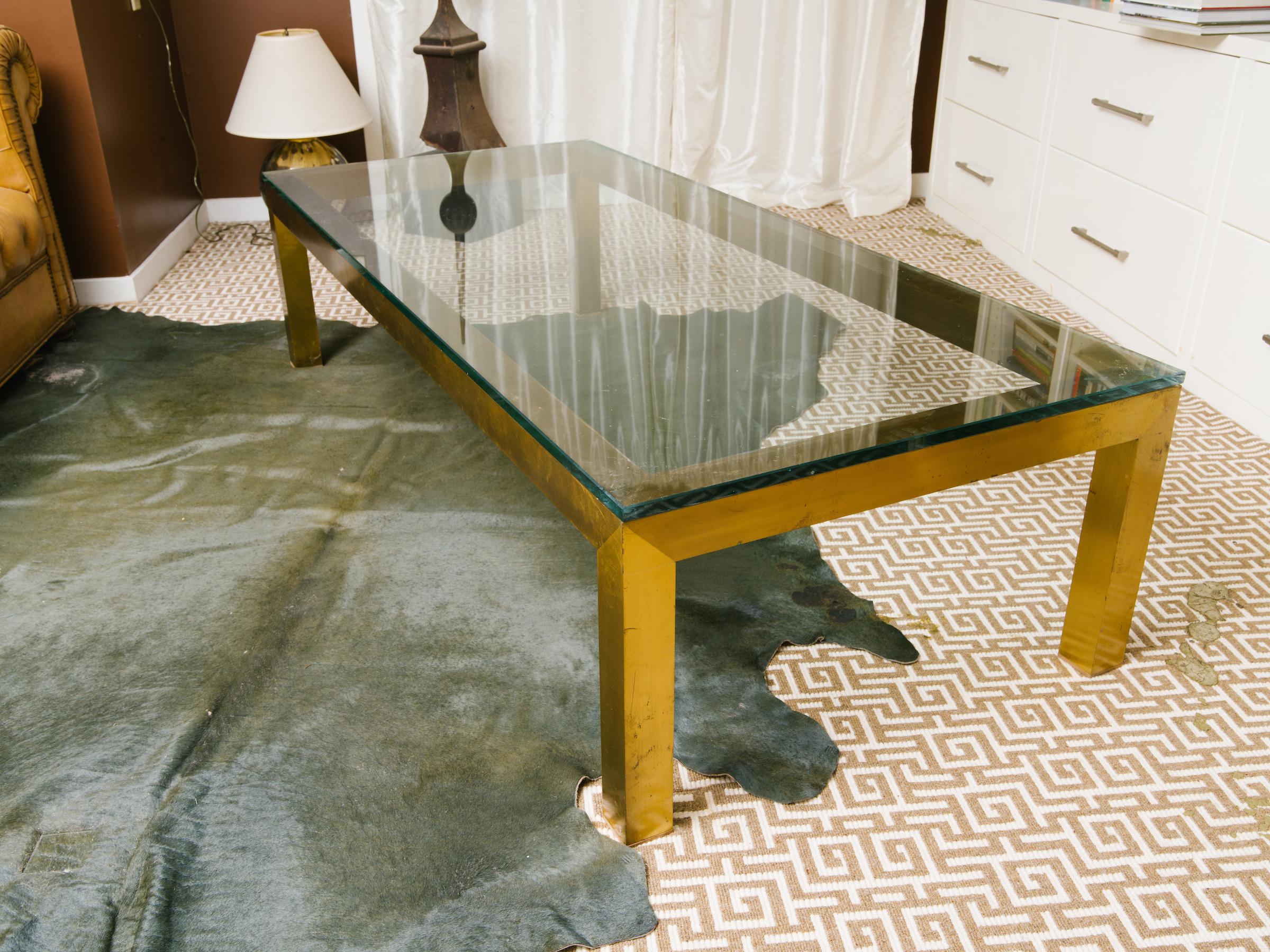 1970s brass and thick glass coffee table.
