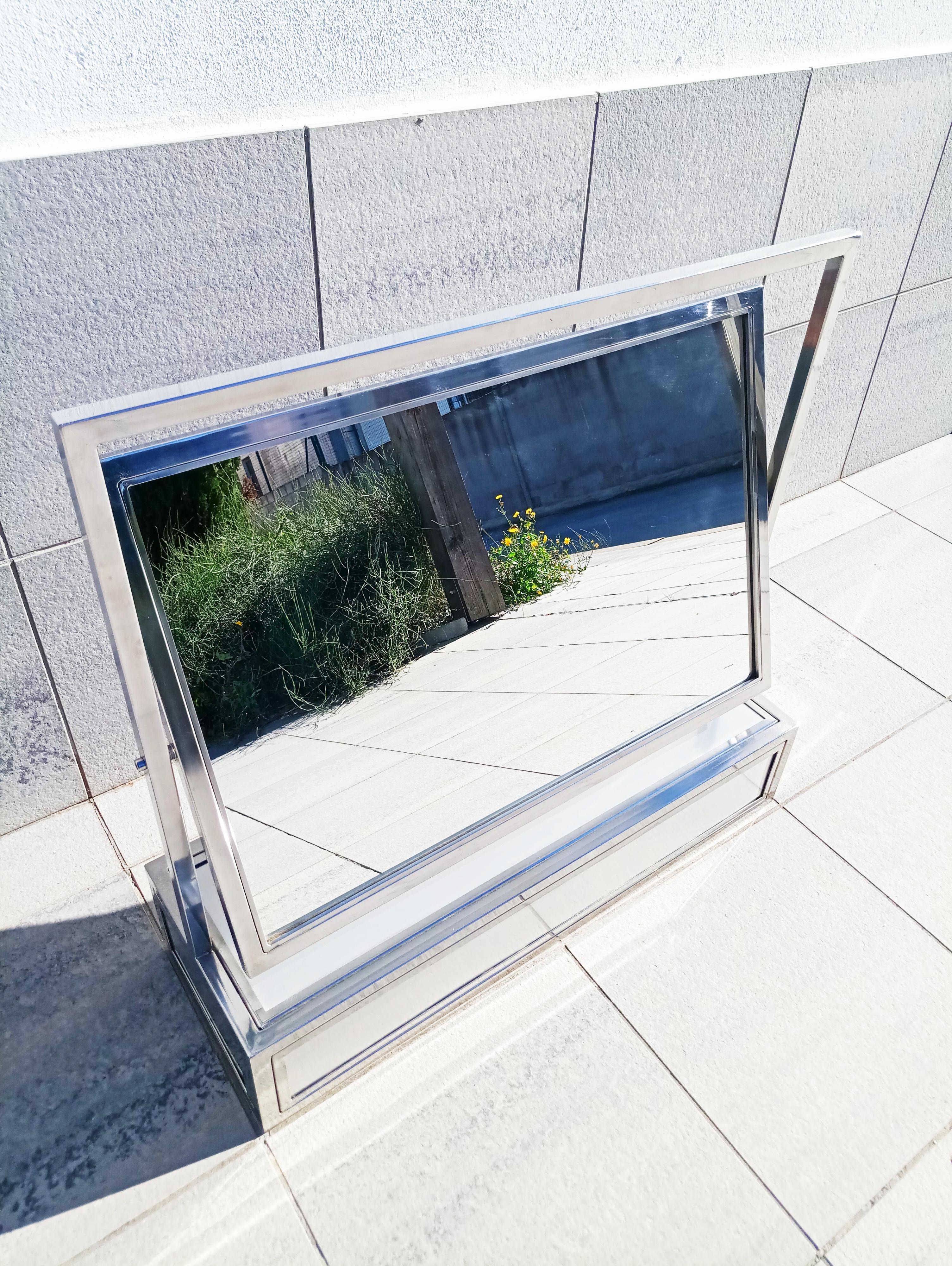 Beautiful and rare 1970s large adjustable mirror, manufactured in France, all chrome metal and glass. In perfect vintage condition. Mirror size (cm): 56 x 38.