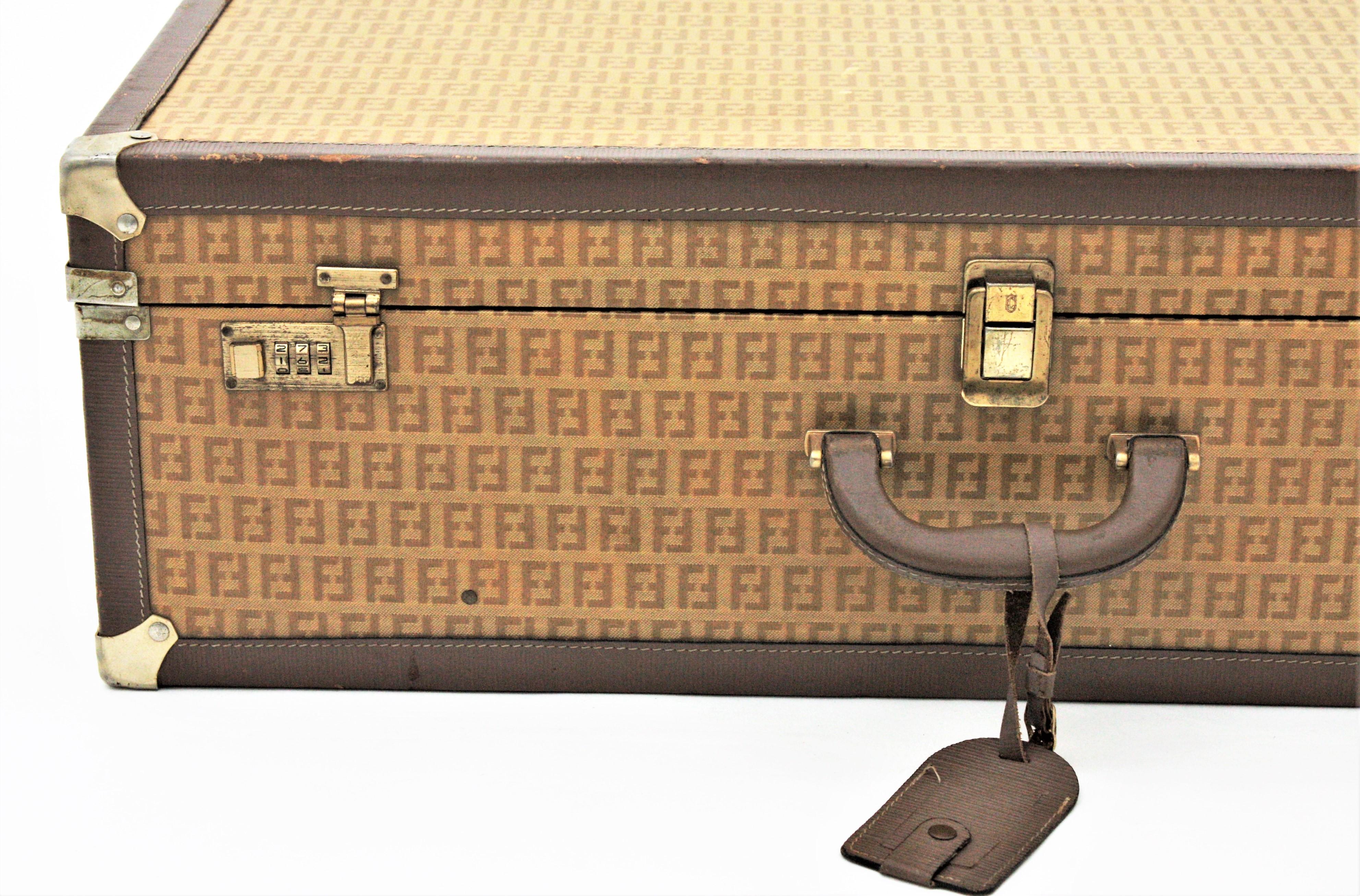 Fendi Zucca Pattern Epi Leather Vintage Luxury Hard Trunk Suitcase, 1970s
Large Fendi Zucca monogrammed large hard suitcase. The Zucca pattern design luggage was made by Italian fashion designer Fendi. Italy 1970s
This hard-sided piece can also be
