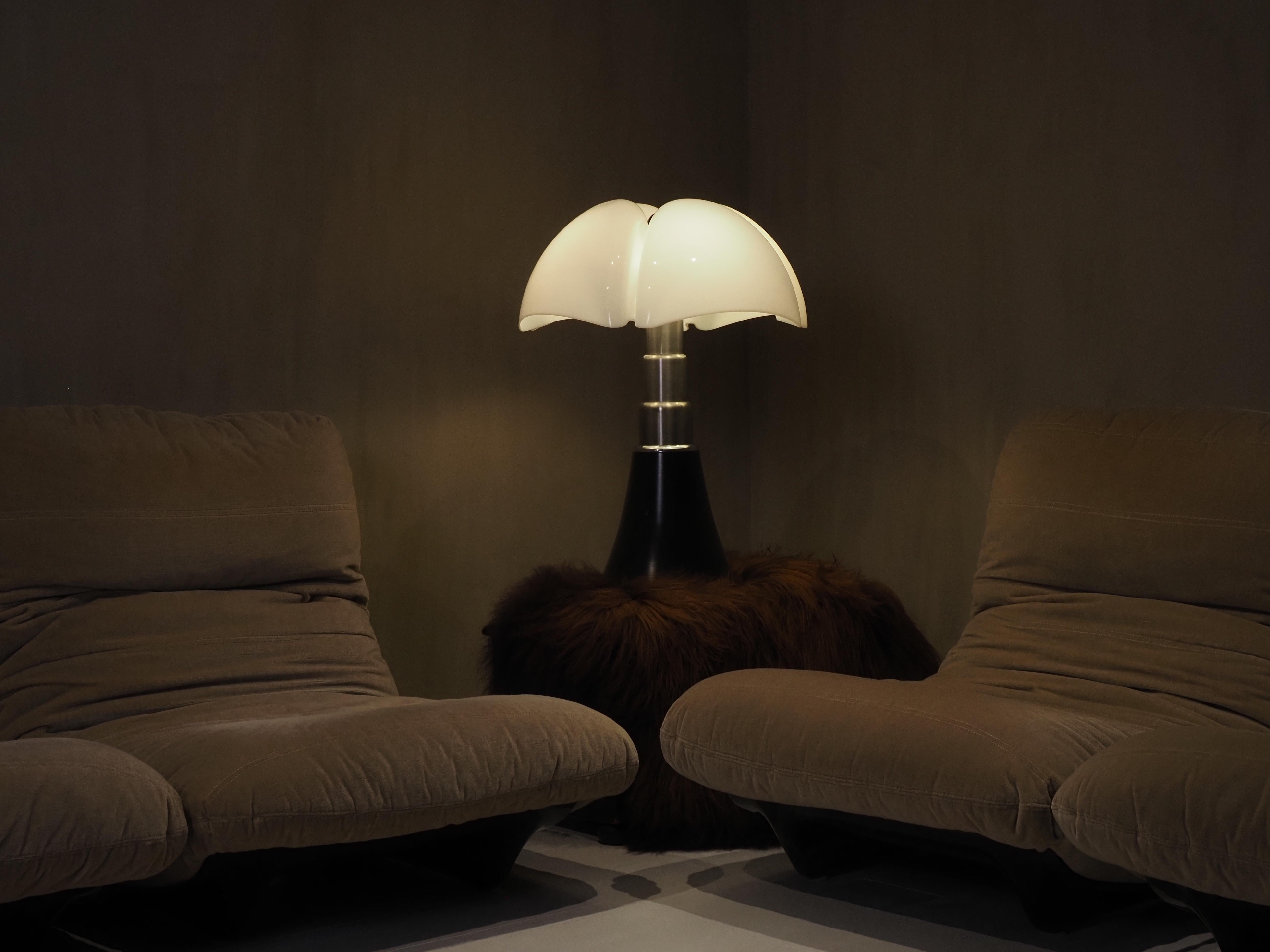 Large Pipistrello table lamp by Gae Aulenti for Martinelli Luce. 
Designed in 1965, this current production comes with a white opal methacrylate diffuser and a base made of glossy black coated aluminum and satin aluminum trim. Can be used as a table